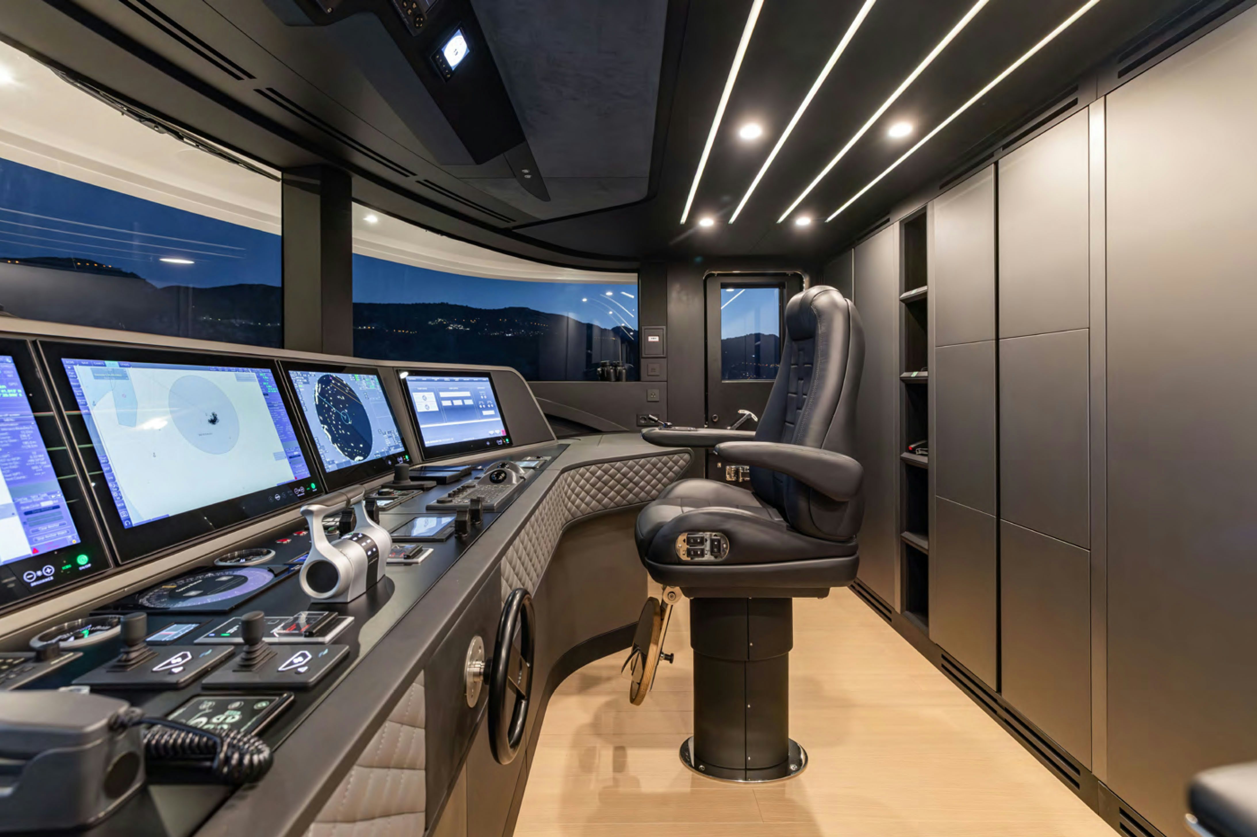 a room with computers and monitors aboard FELICITA Yacht for Charter