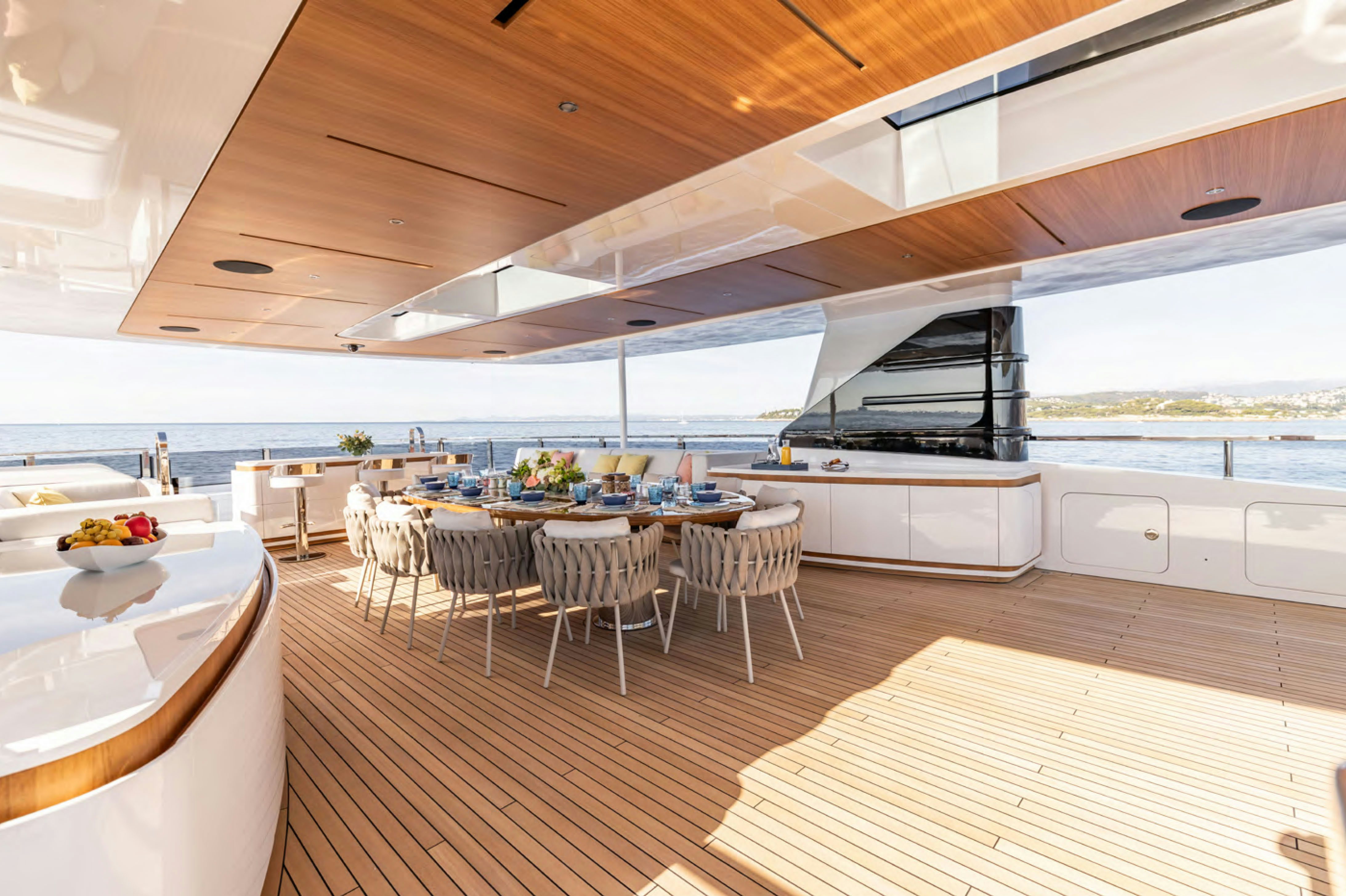 a modern kitchen with white cabinets aboard FELICITA Yacht for Charter