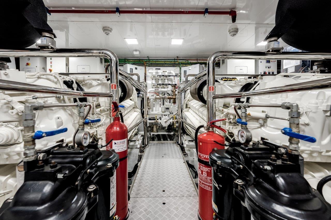 a room full of white equipment aboard AMICO Yacht for Sale