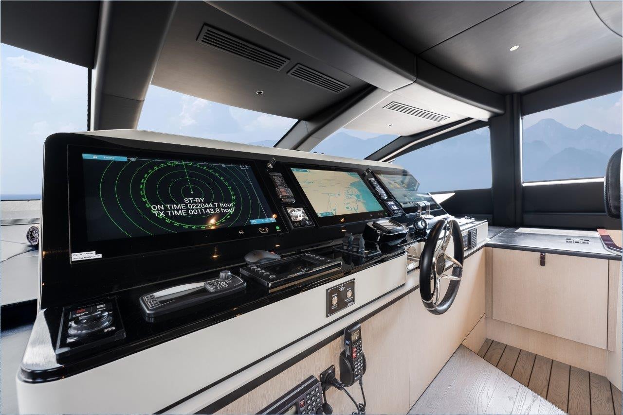 the inside of a car aboard AMICO Yacht for Sale