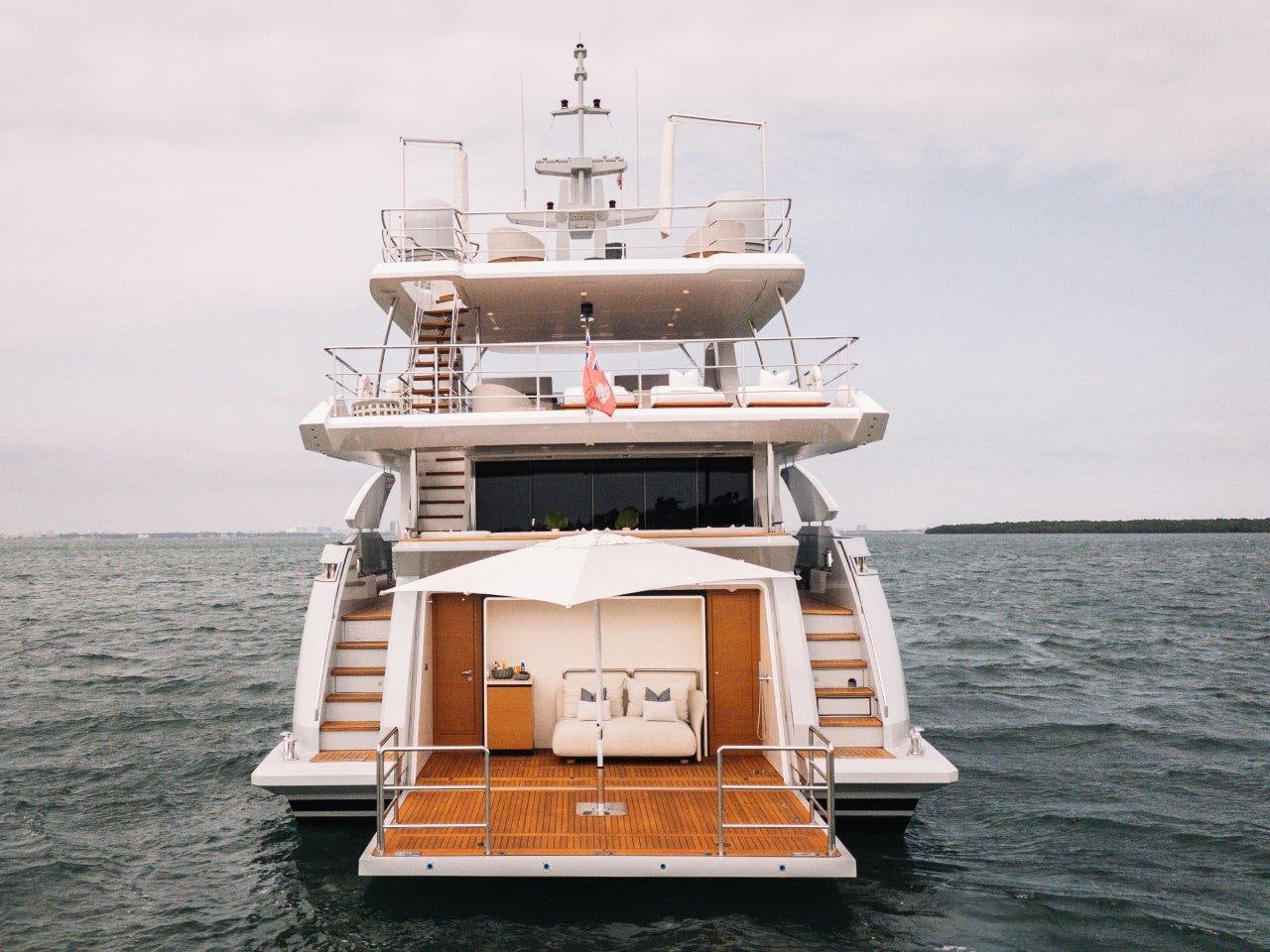 a large white ship in the water aboard AMICO Yacht for Sale