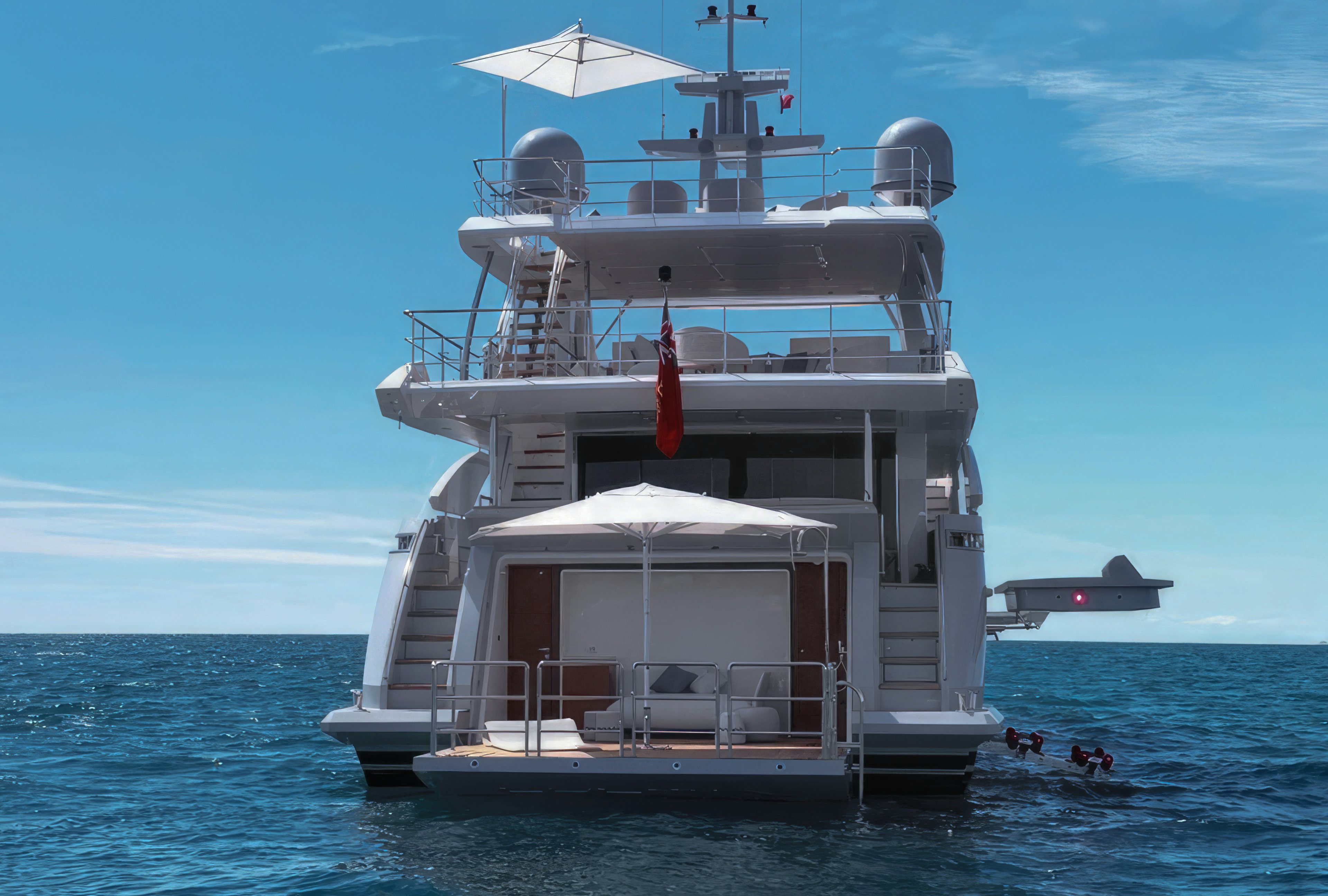 a large white boat in the water aboard AMICO Yacht for Sale