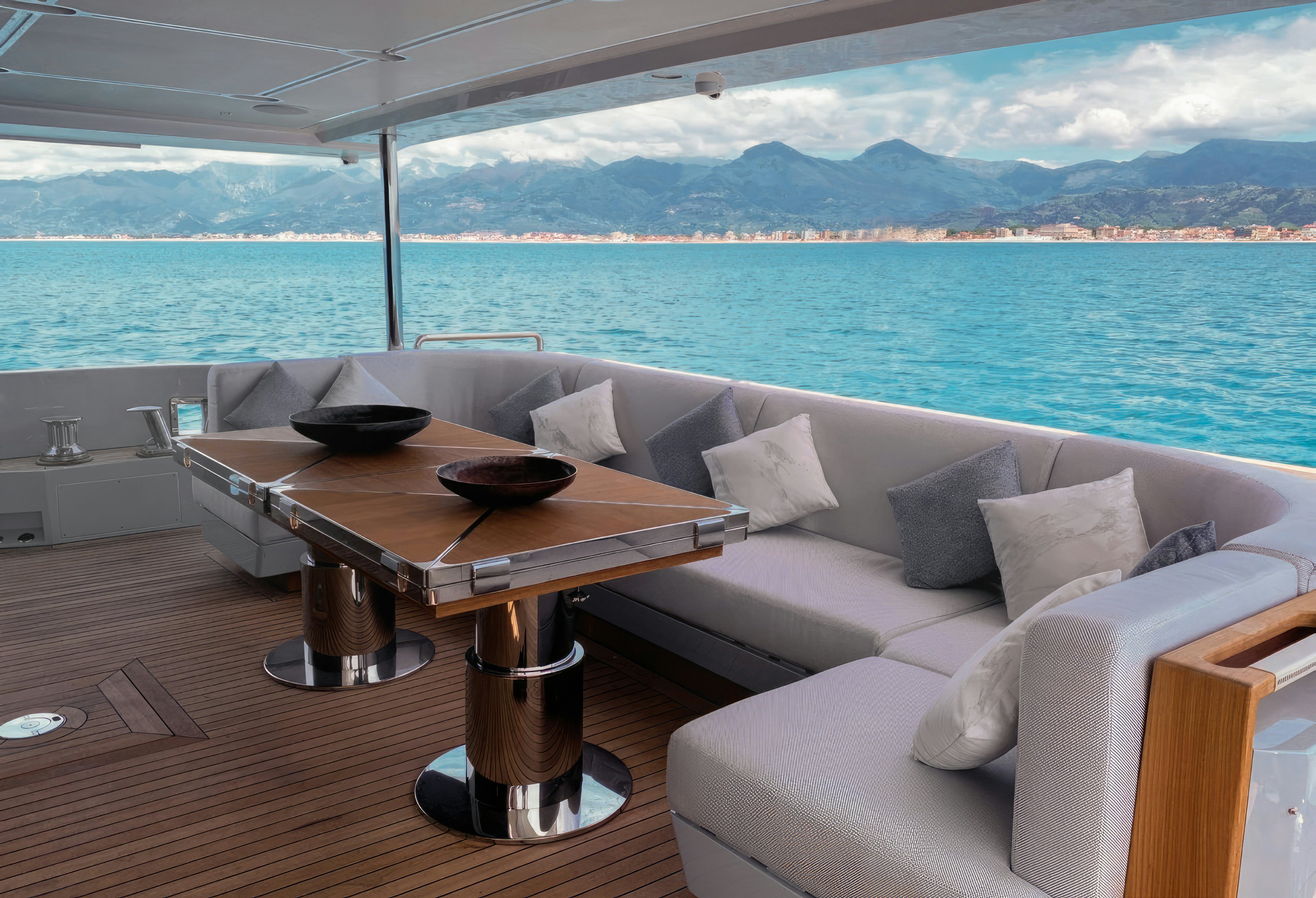 a living room with a large body of water aboard AMICO Yacht for Sale