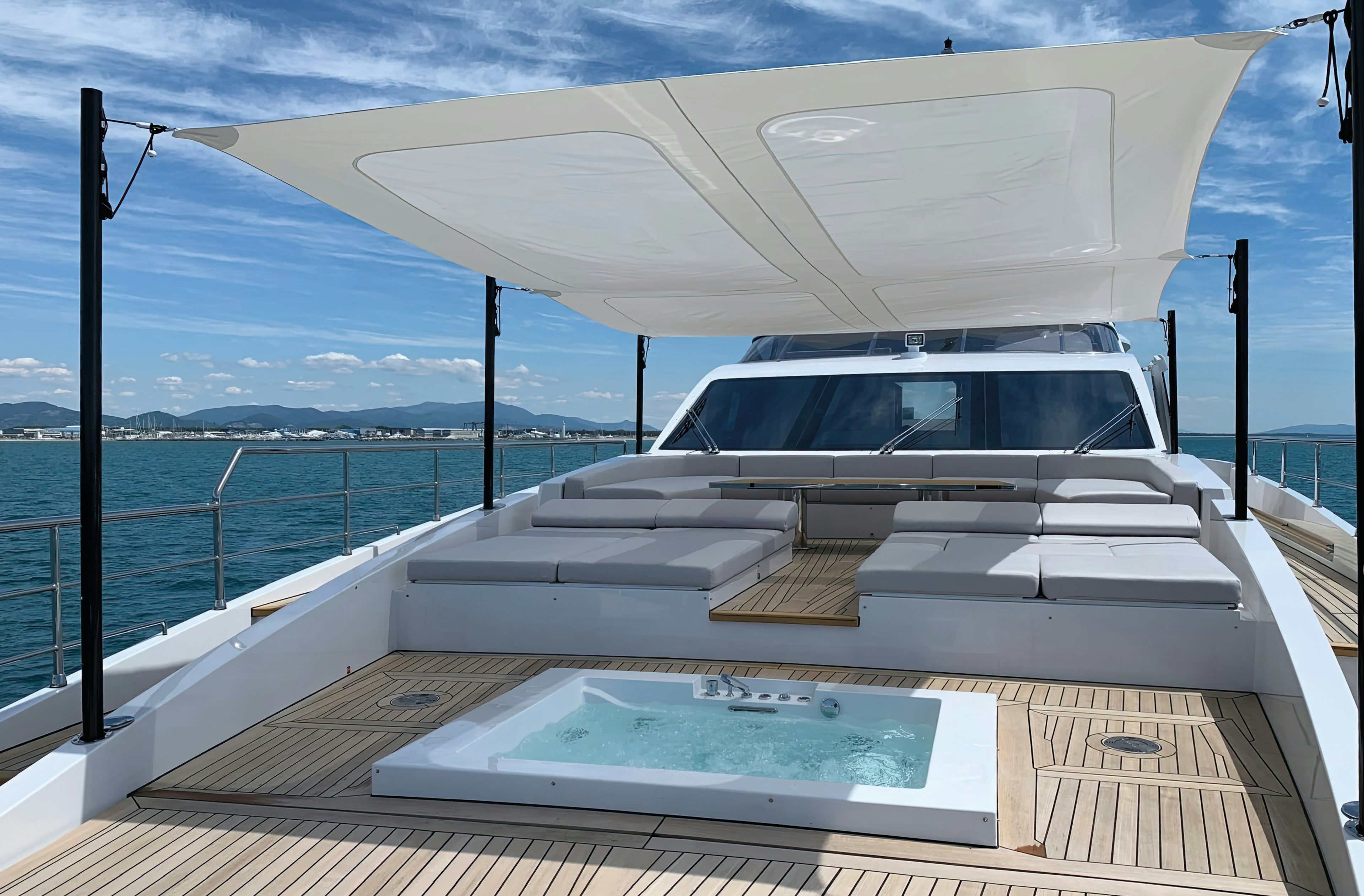 a boat on a deck aboard AMICO Yacht for Sale
