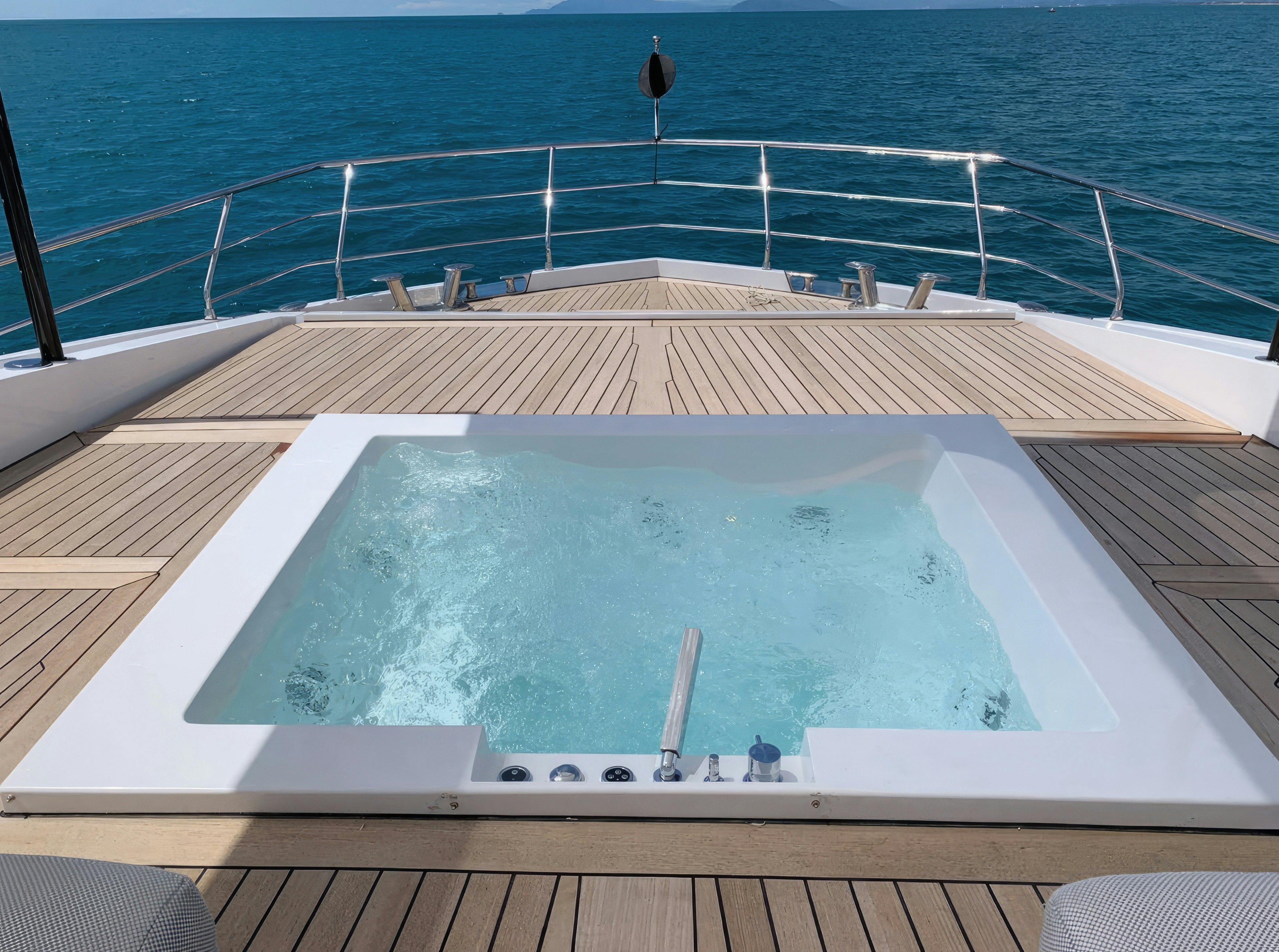 a large swimming pool aboard AMICO Yacht for Sale