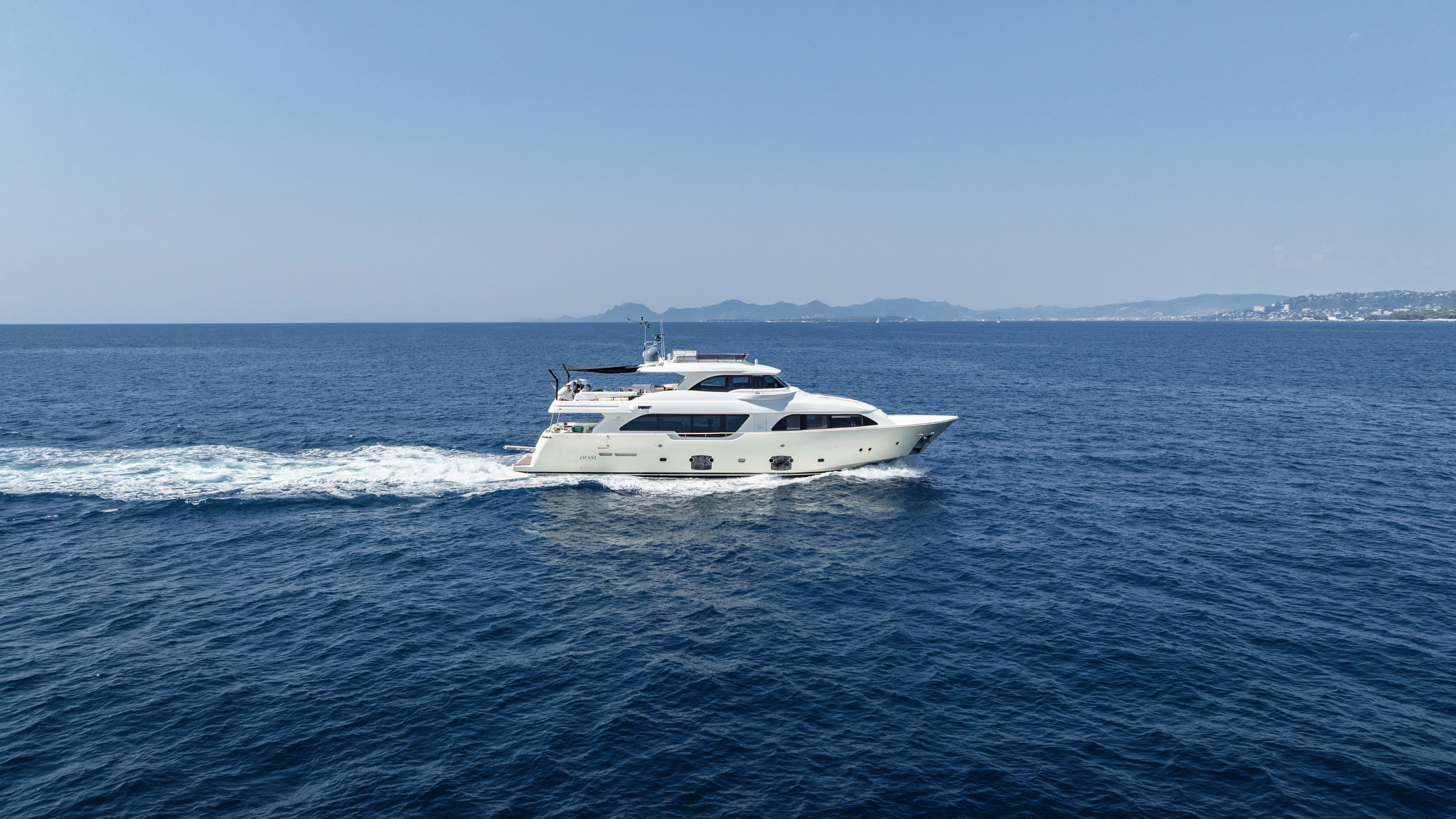 a white boat in the water aboard GIADA Yacht for Sale