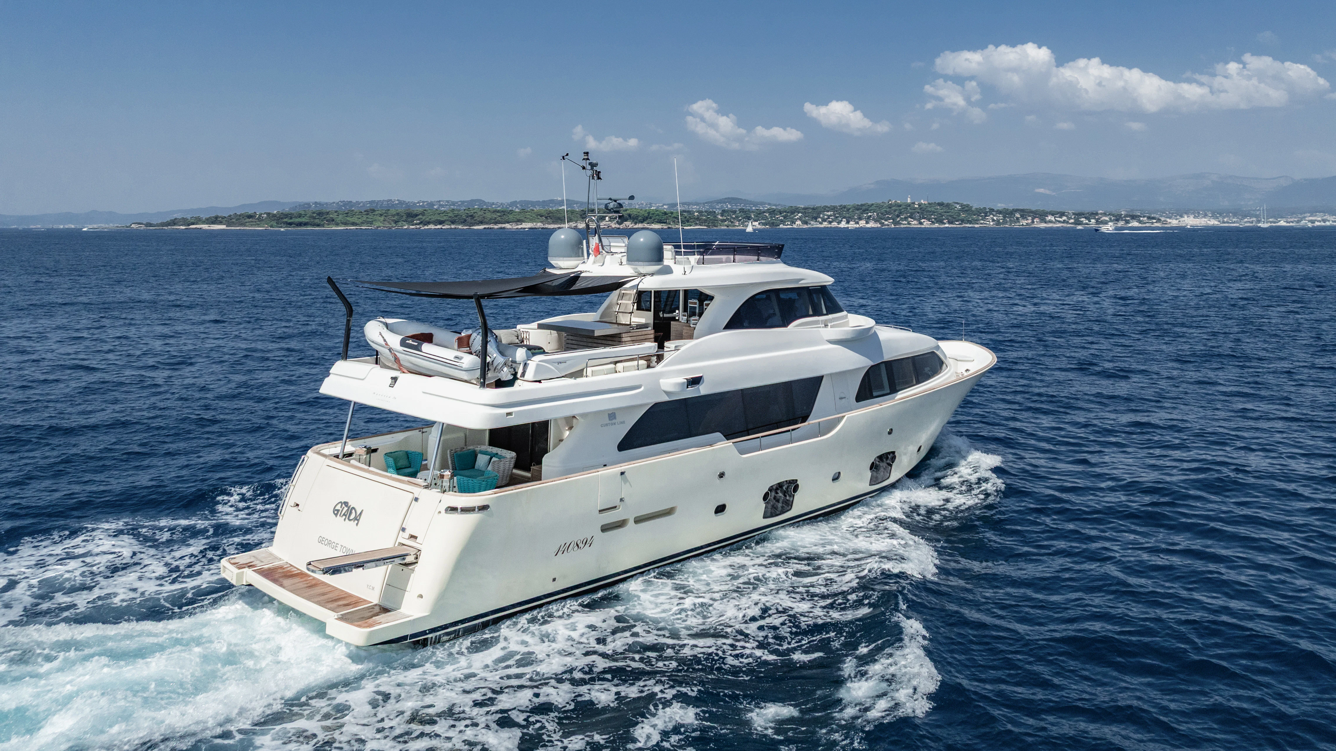 a white yacht on the water aboard GIADA Yacht for Sale