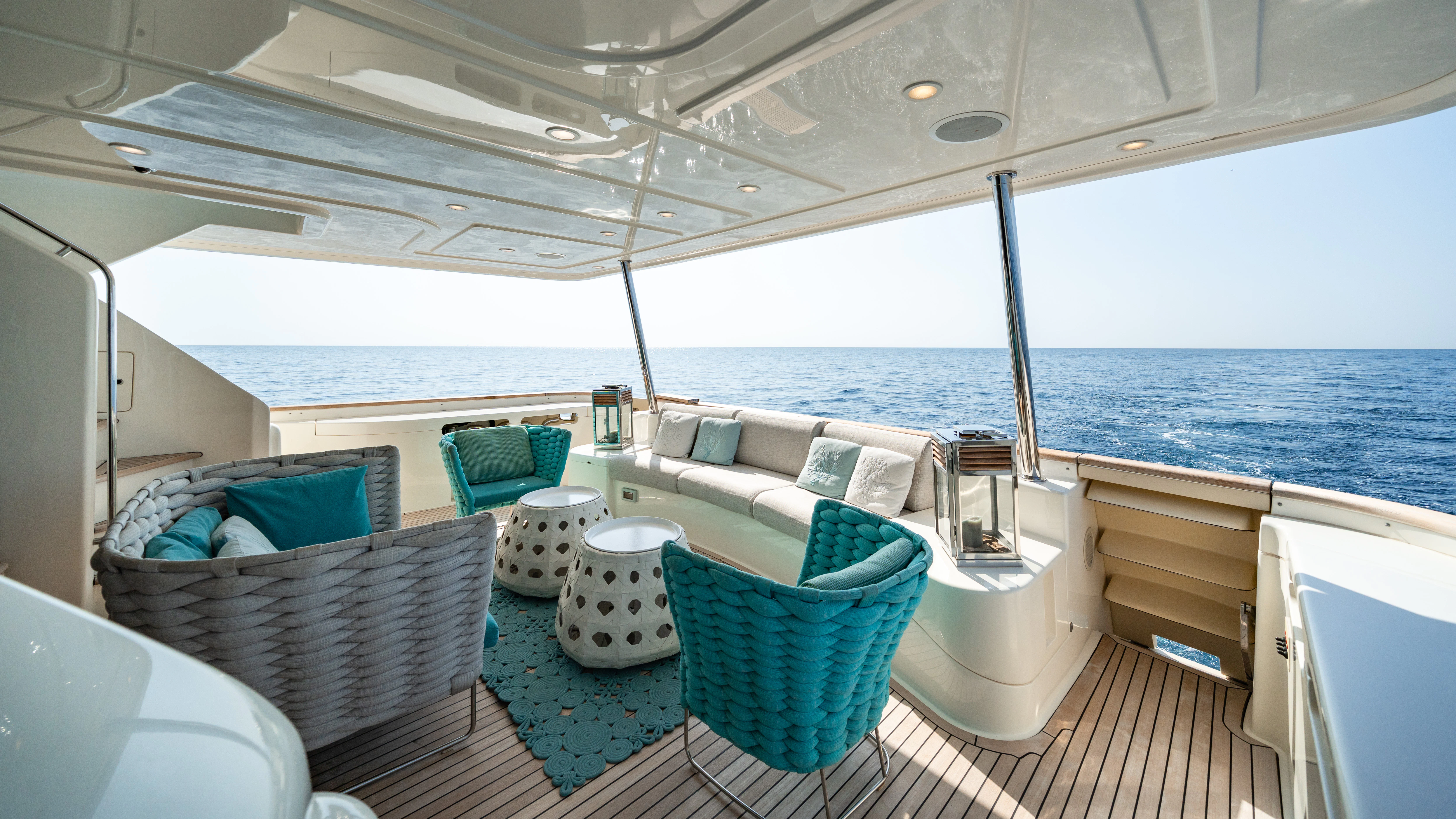 a boat with a table and chairs on the deck aboard GIADA Yacht for Sale