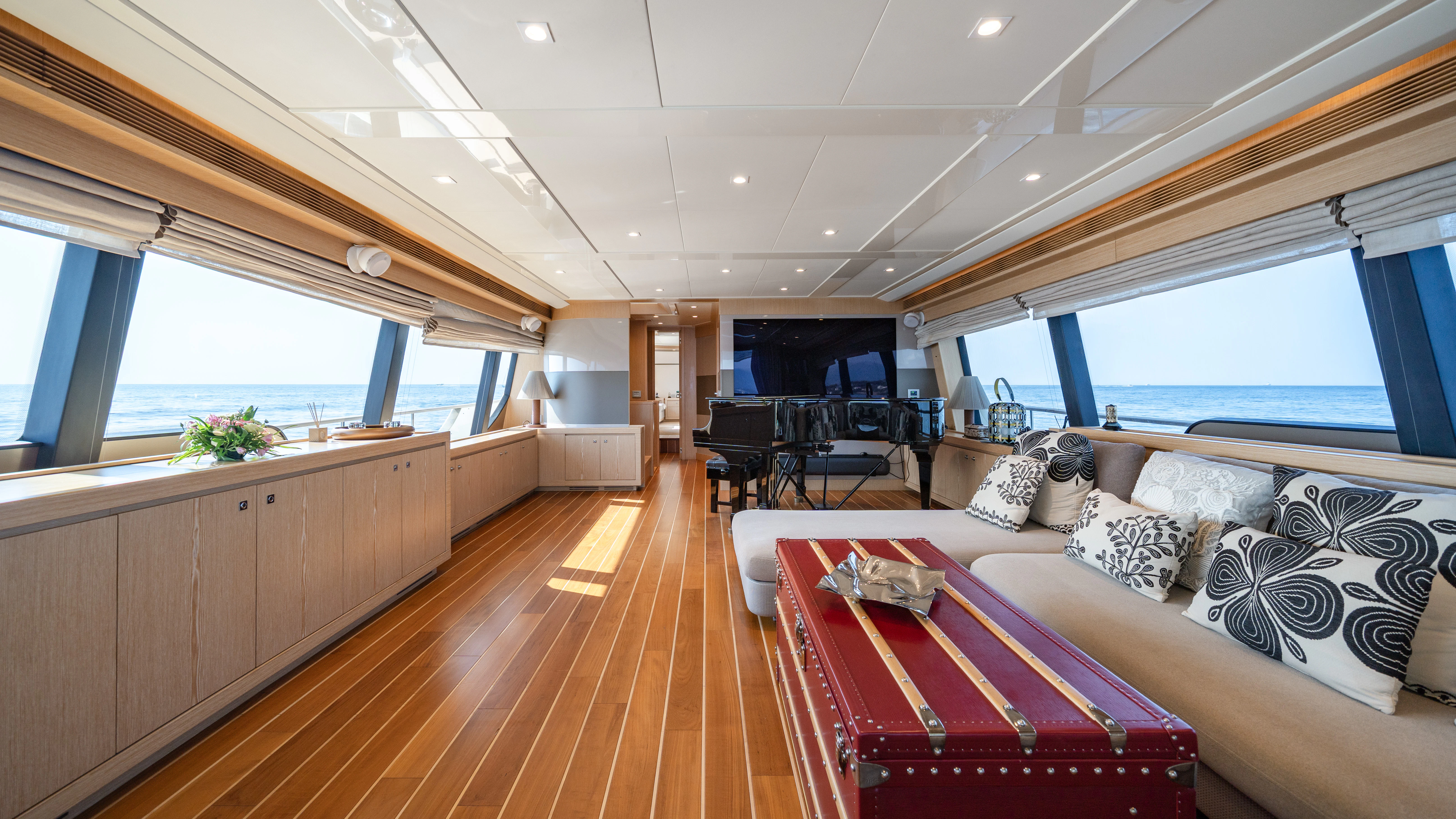 a room with a bed and a couch aboard GIADA Yacht for Sale