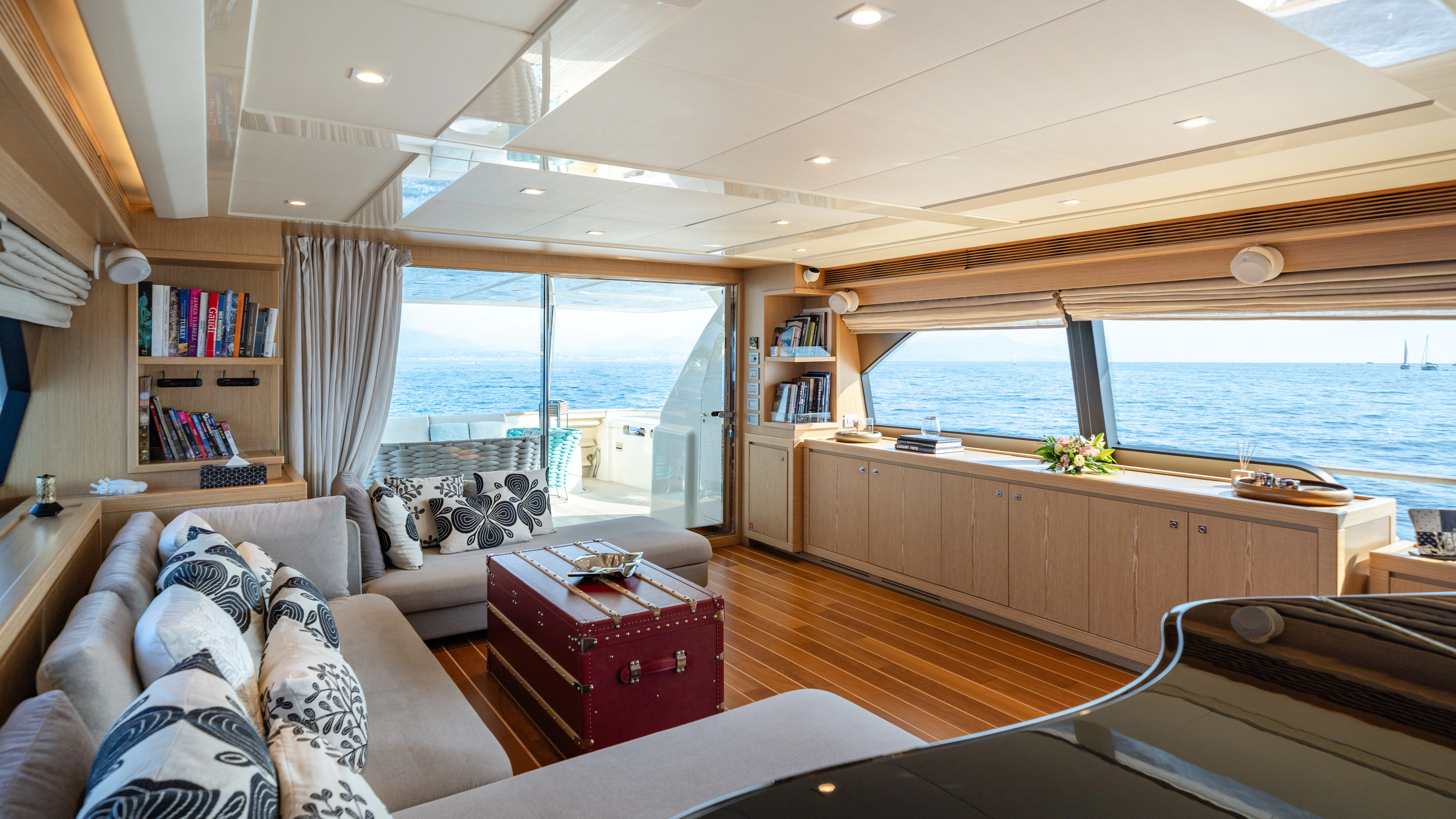 a living room with a large window aboard GIADA Yacht for Sale