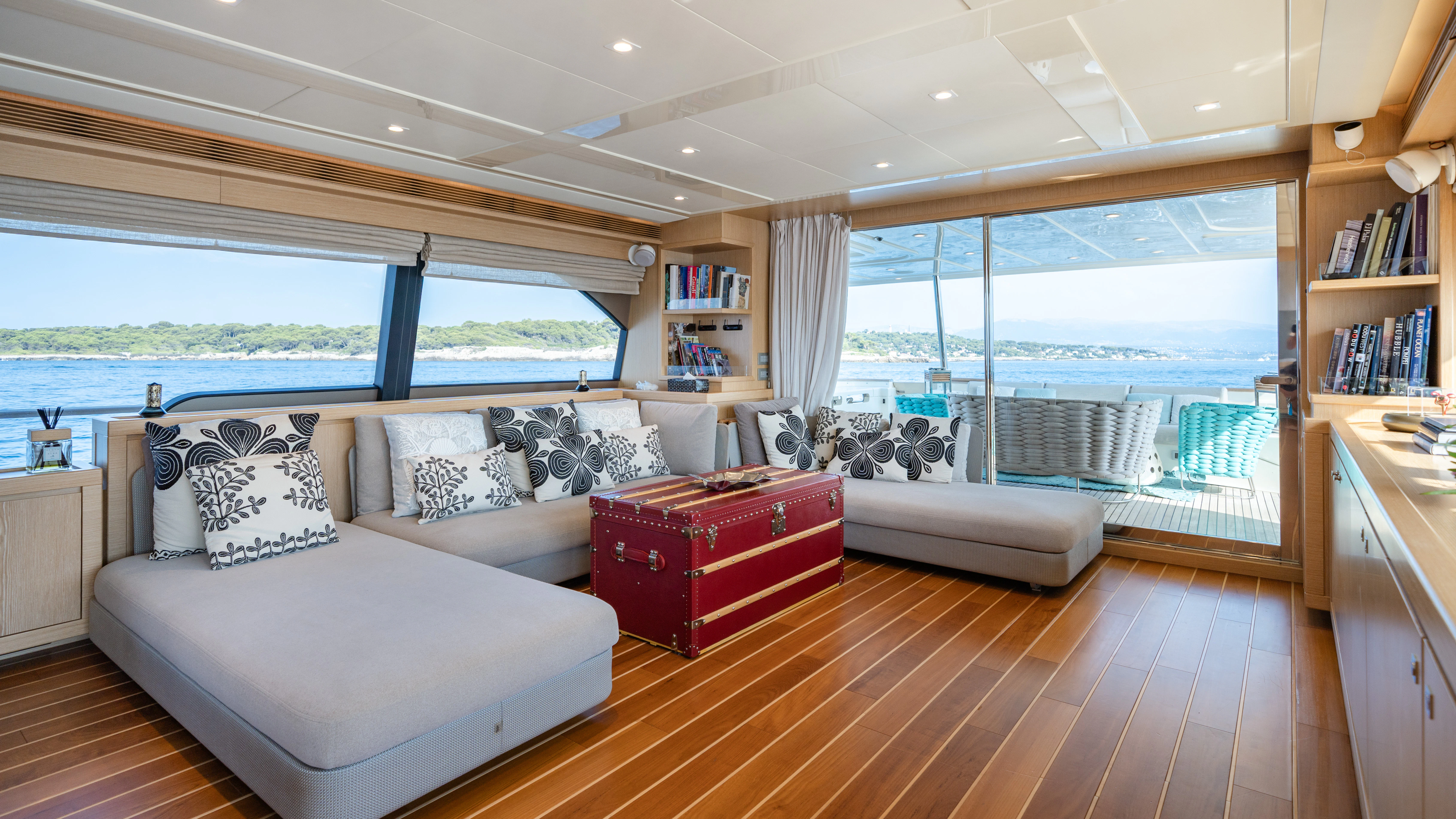 a room with a bed and a large window aboard GIADA Yacht for Sale