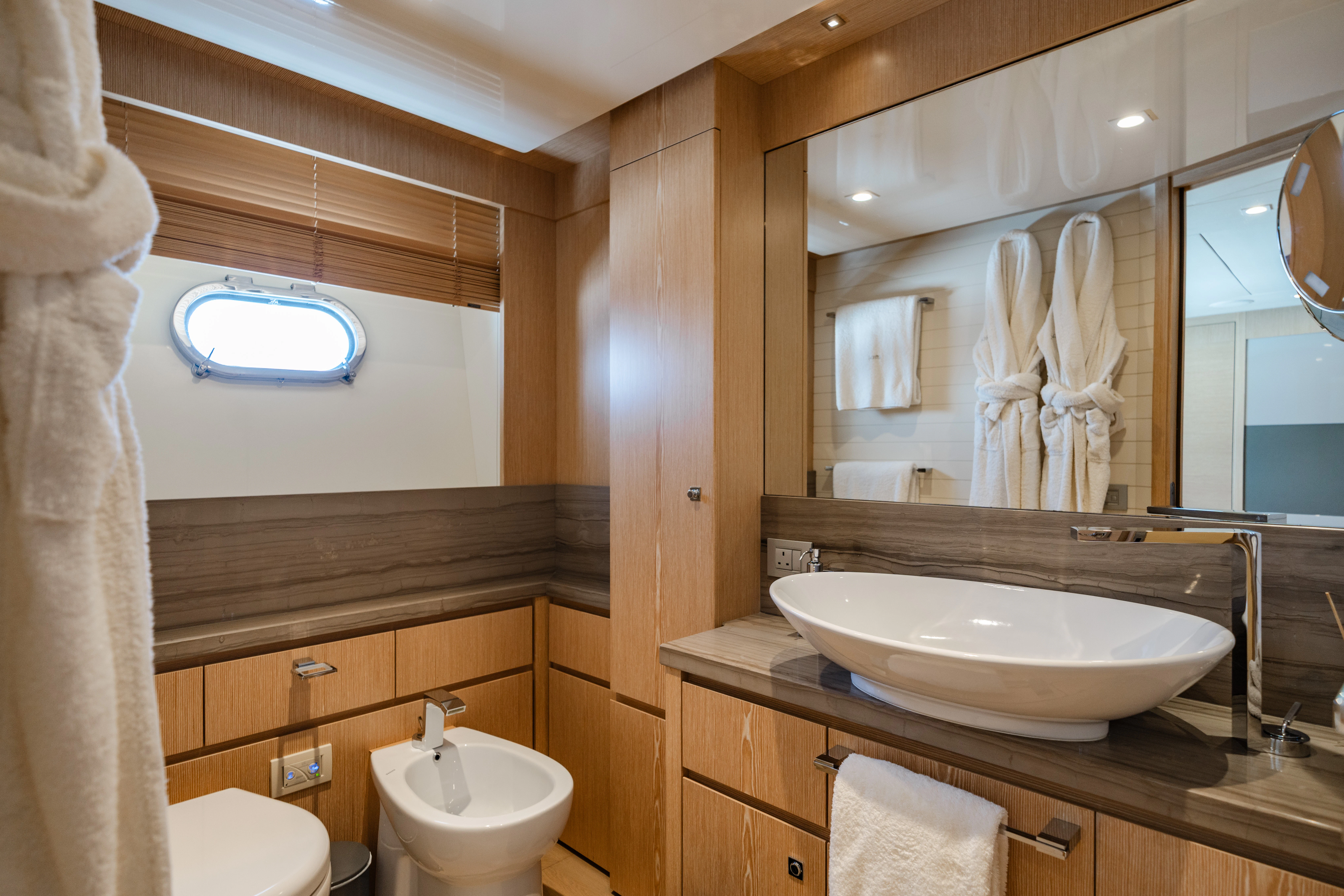 a bathroom with a sink and a mirror aboard GIADA Yacht for Sale