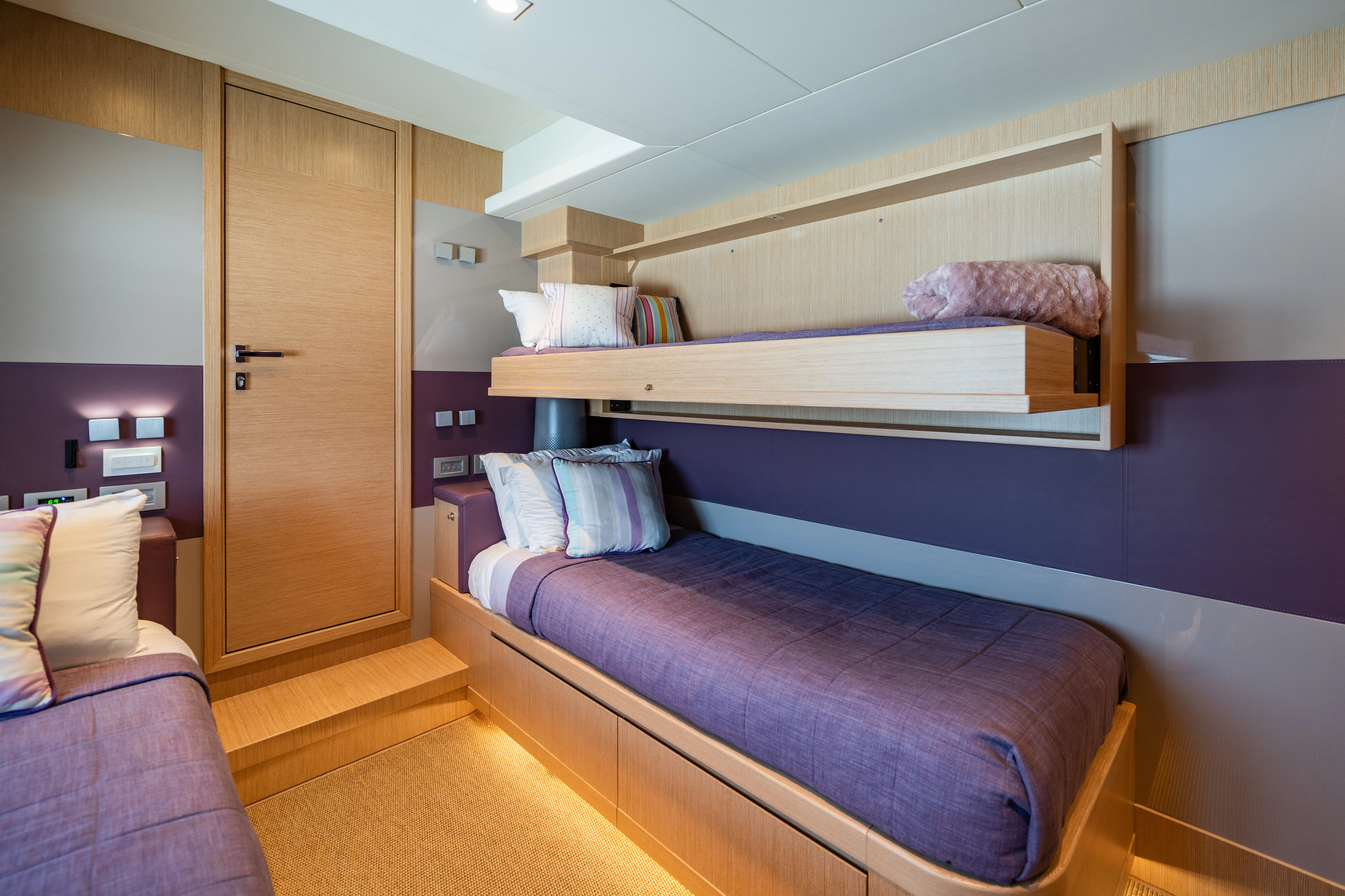 a room with a bed and a couch aboard GIADA Yacht for Sale