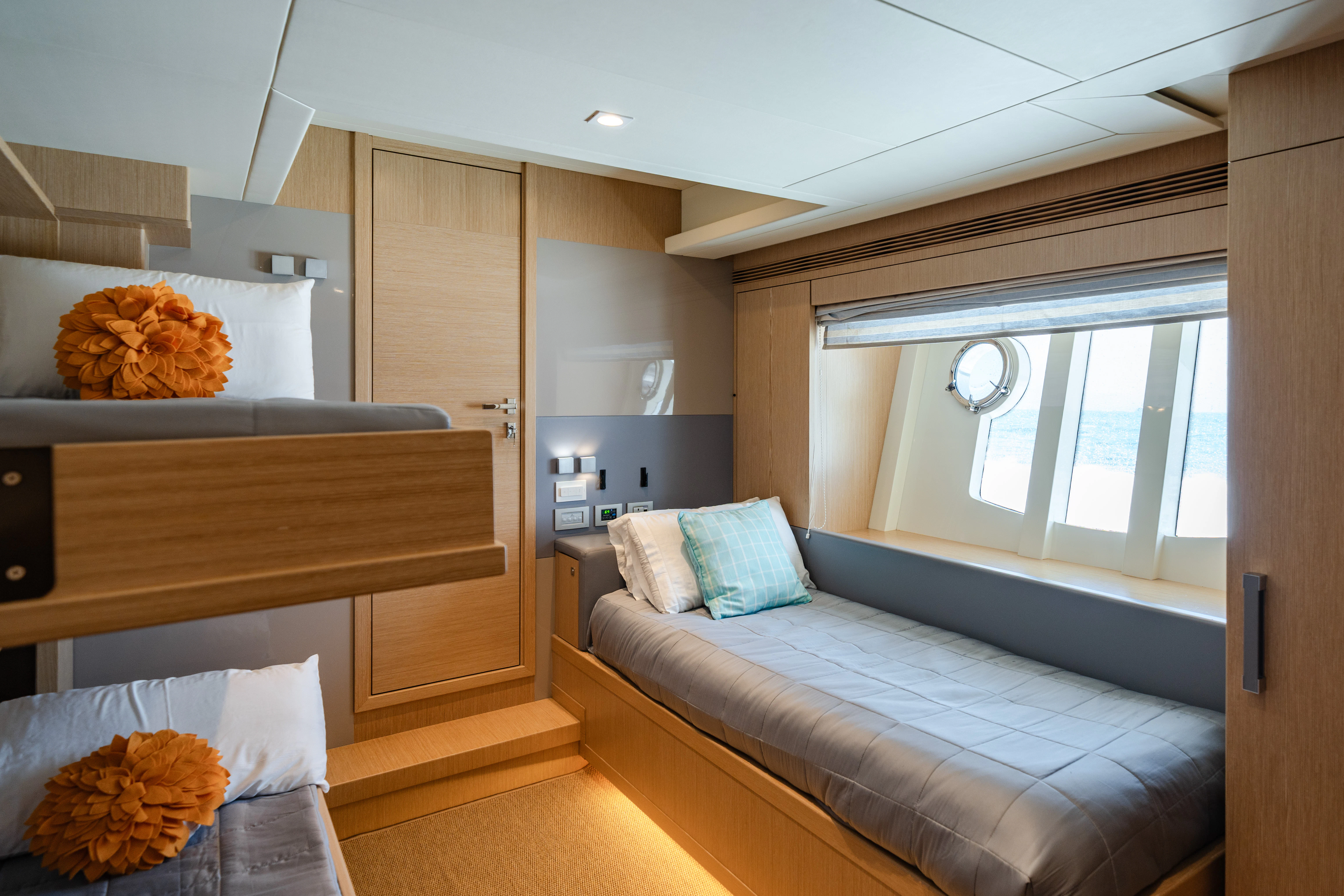 a bedroom with a bed and a desk aboard GIADA Yacht for Sale