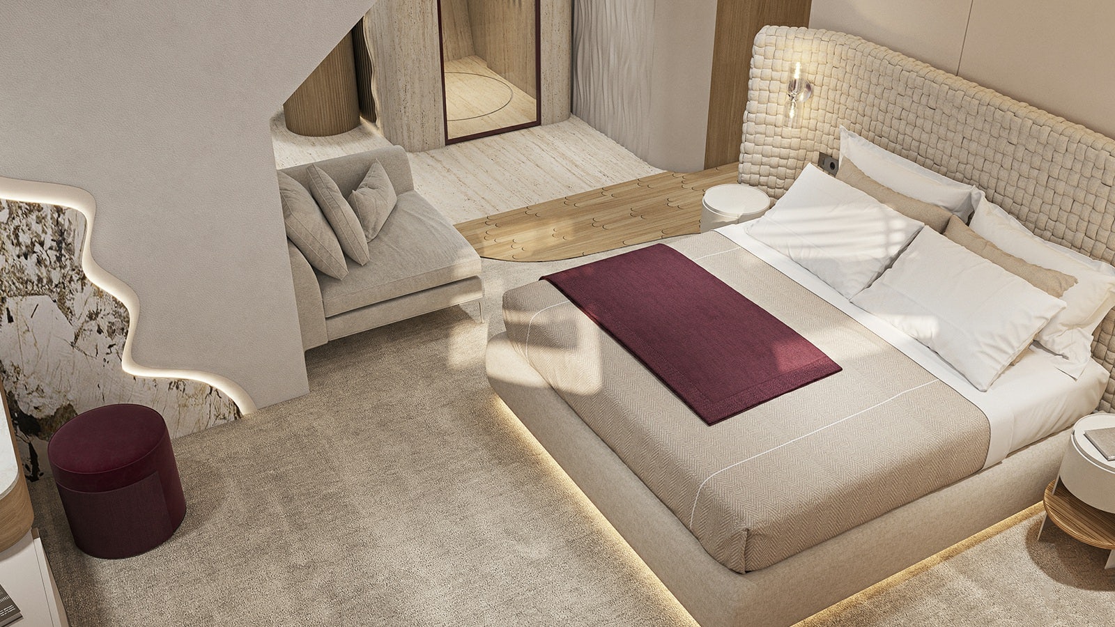 a room with a bed and a chair aboard REPOSADO Yacht for Charter