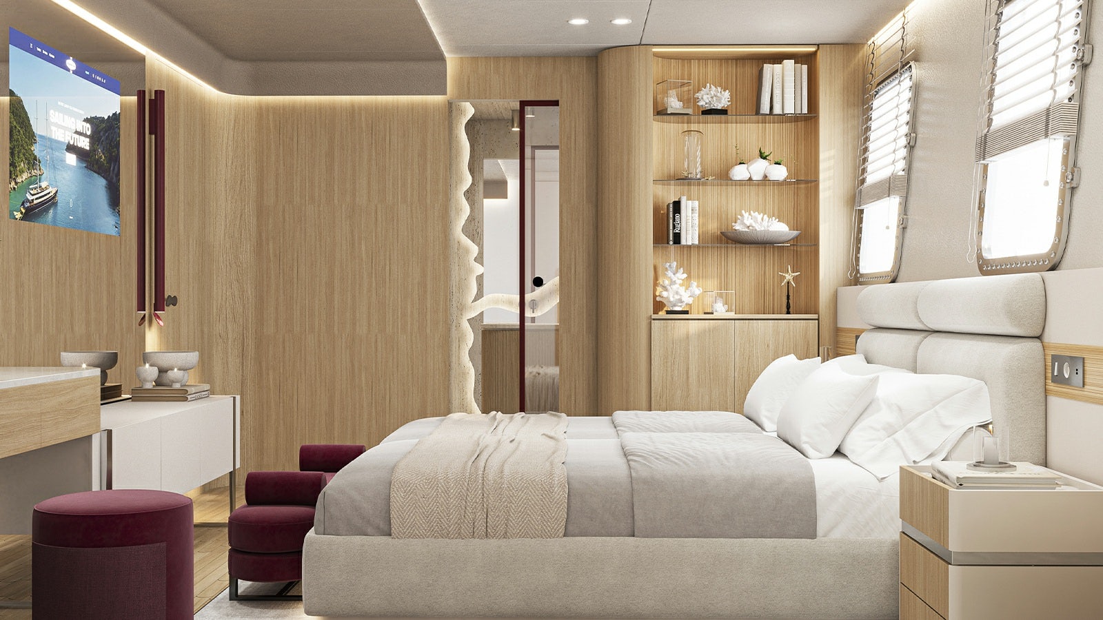 a living room with a couch and a shelf with books on it aboard REPOSADO Yacht for Charter