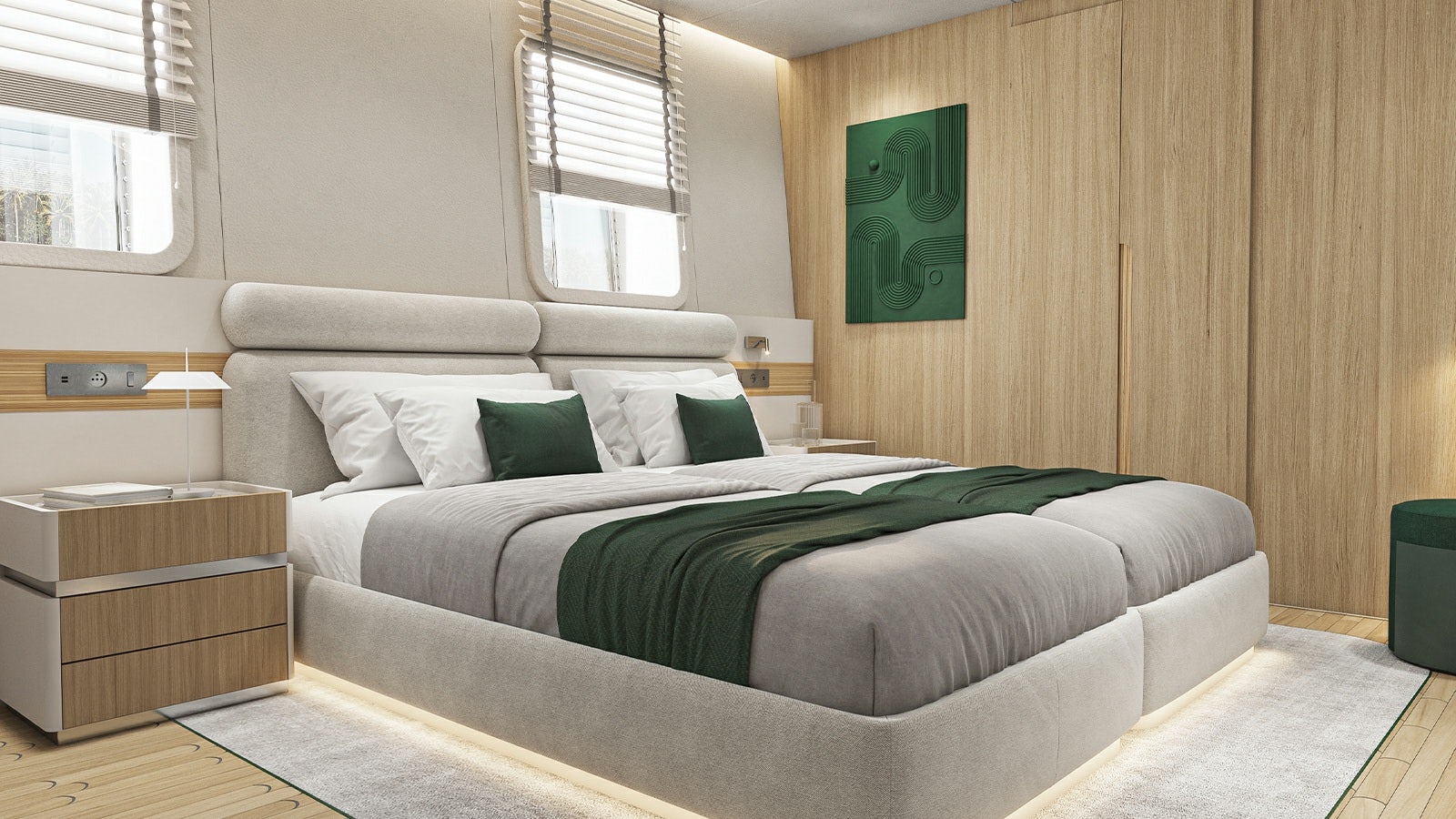 a bed with a green pillow aboard REPOSADO Yacht for Charter