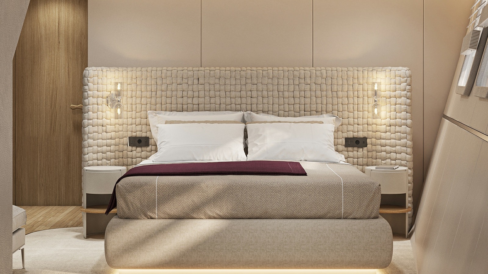 a bed with a pink and white pillow aboard REPOSADO Yacht for Charter