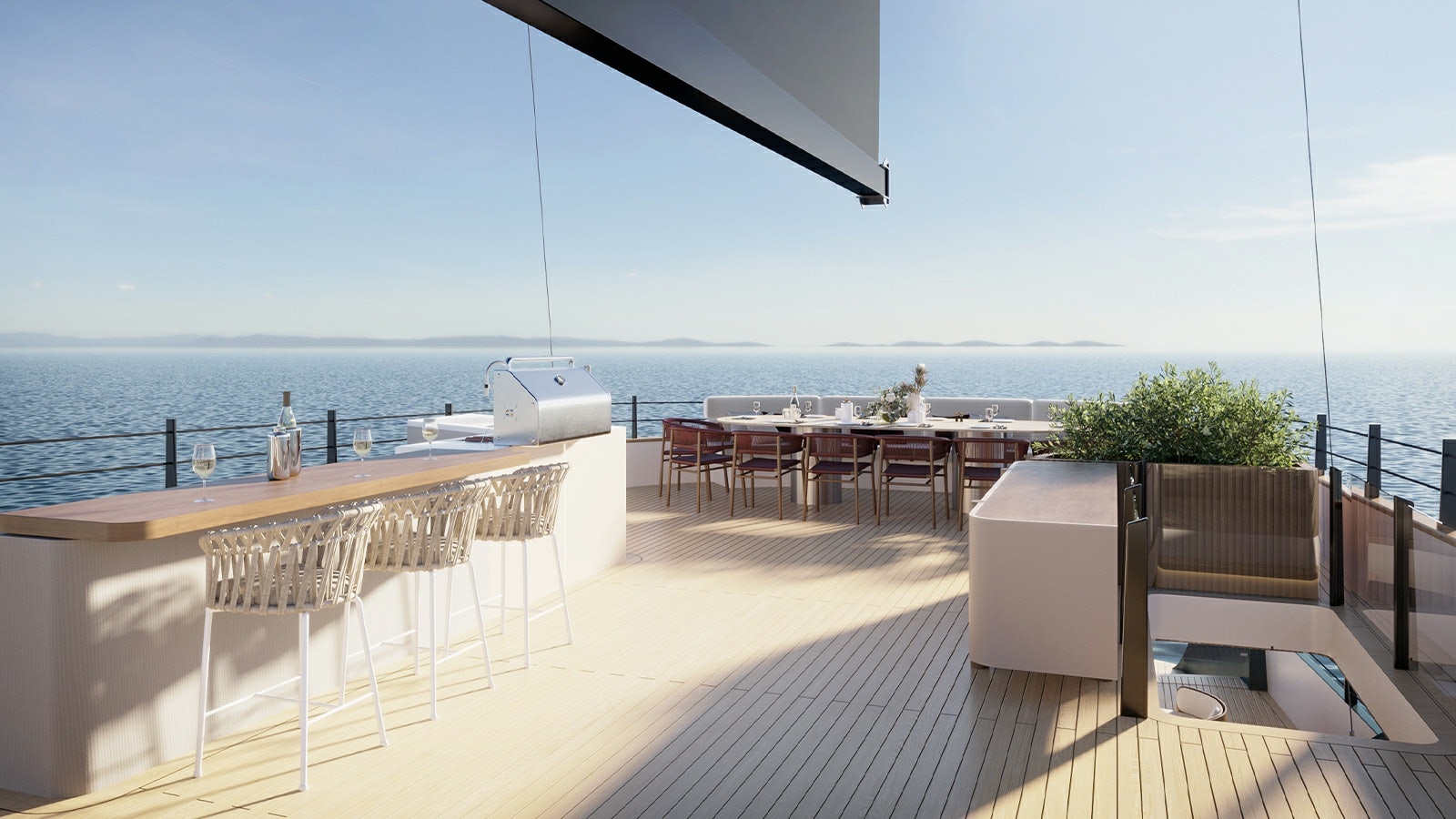 a deck with a large body of water and a boat on it aboard REPOSADO Yacht for Charter