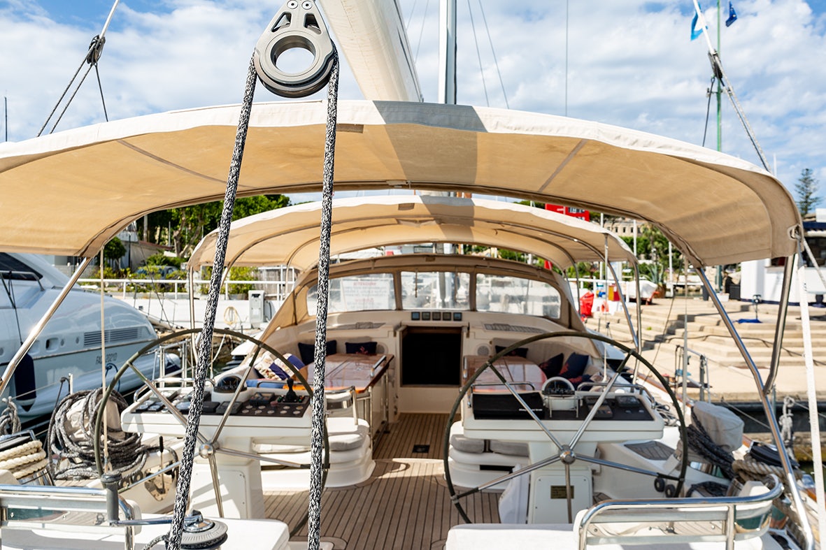 a boat docked at a pier aboard CYGNUS OF ANGLESEY Yacht for Sale