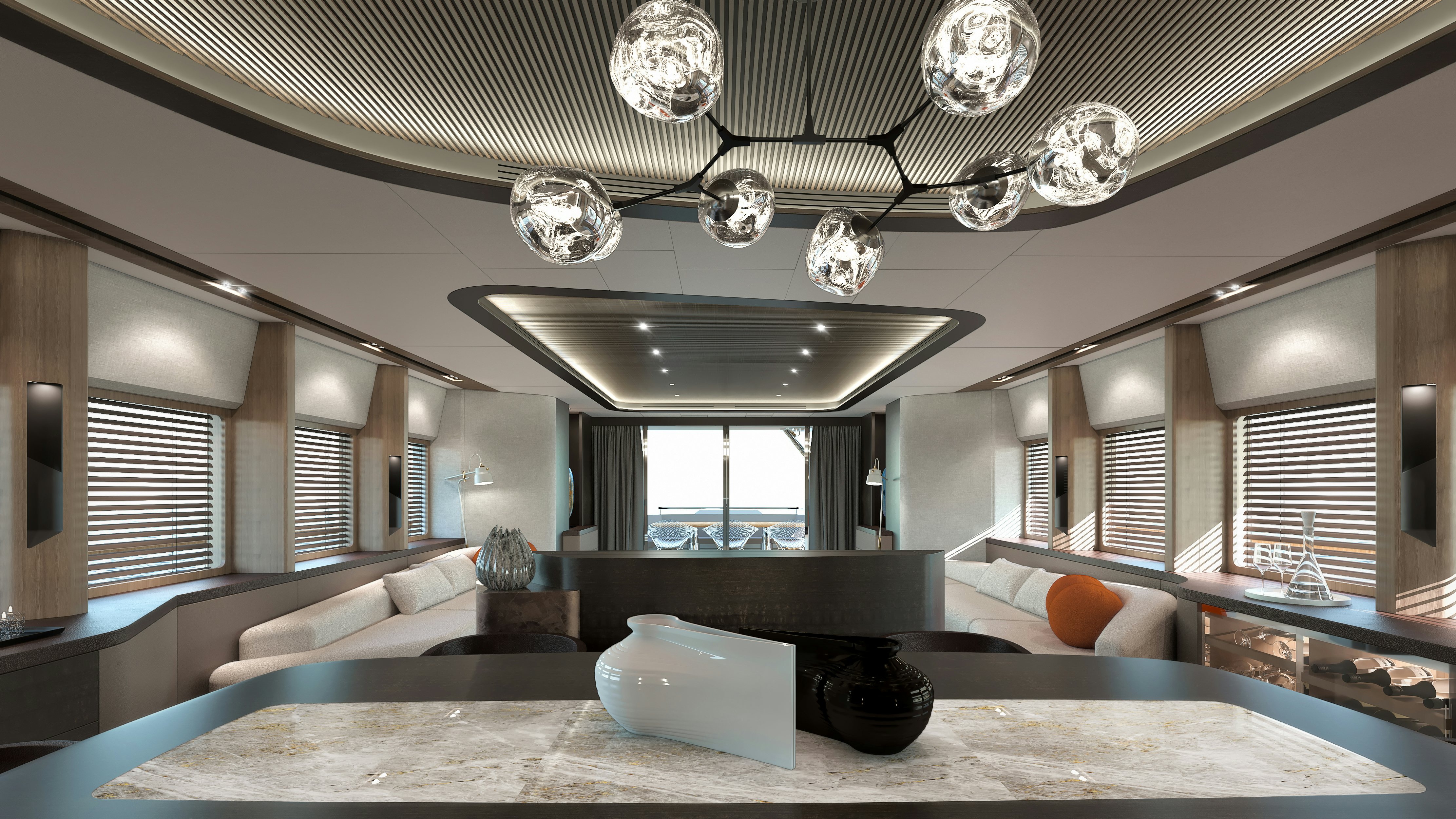 a large room with a chandelier and a couch aboard KANDO 110 Yacht for Sale