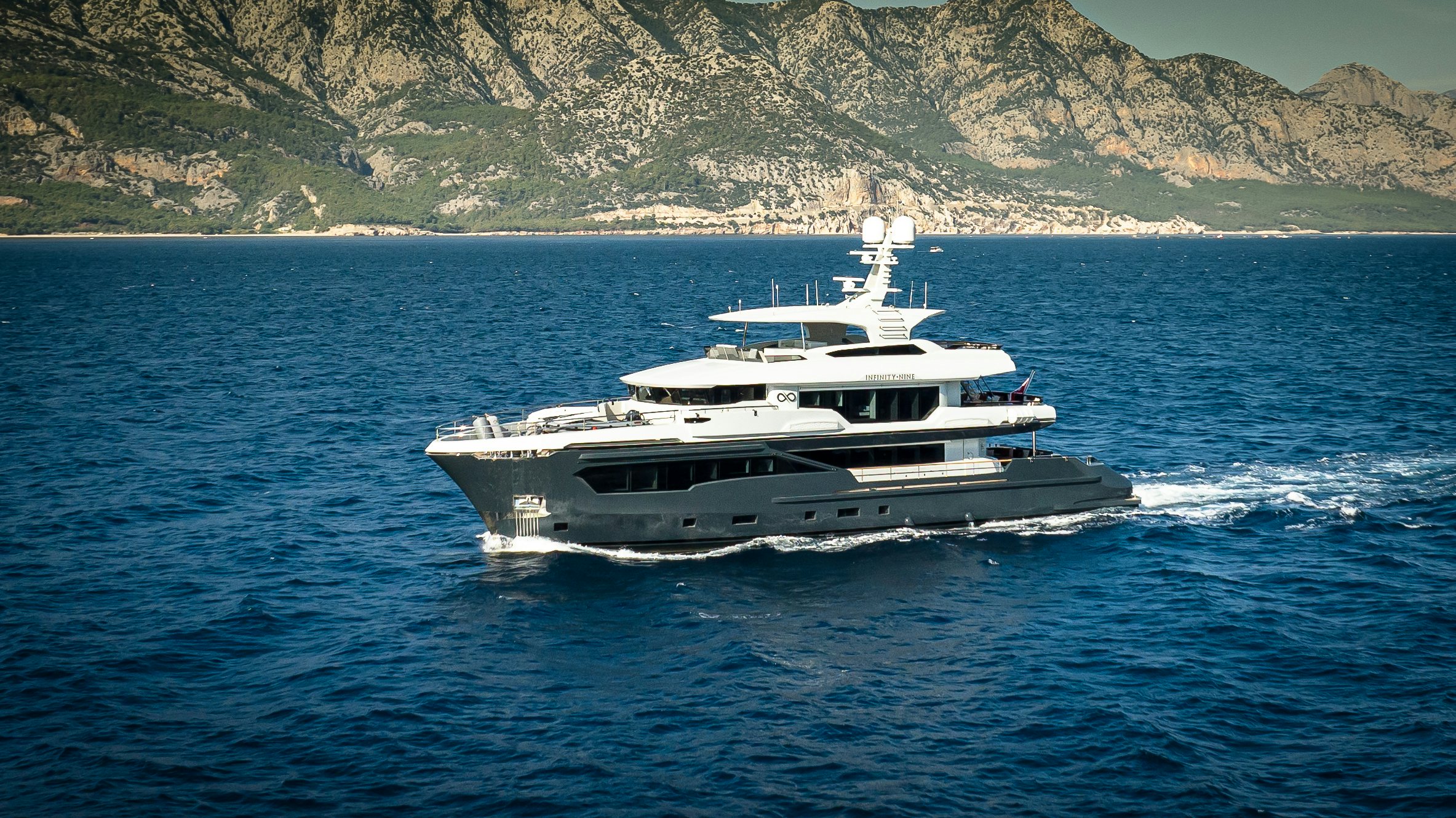 a boat in the water aboard KANDO 110 Yacht for Sale
