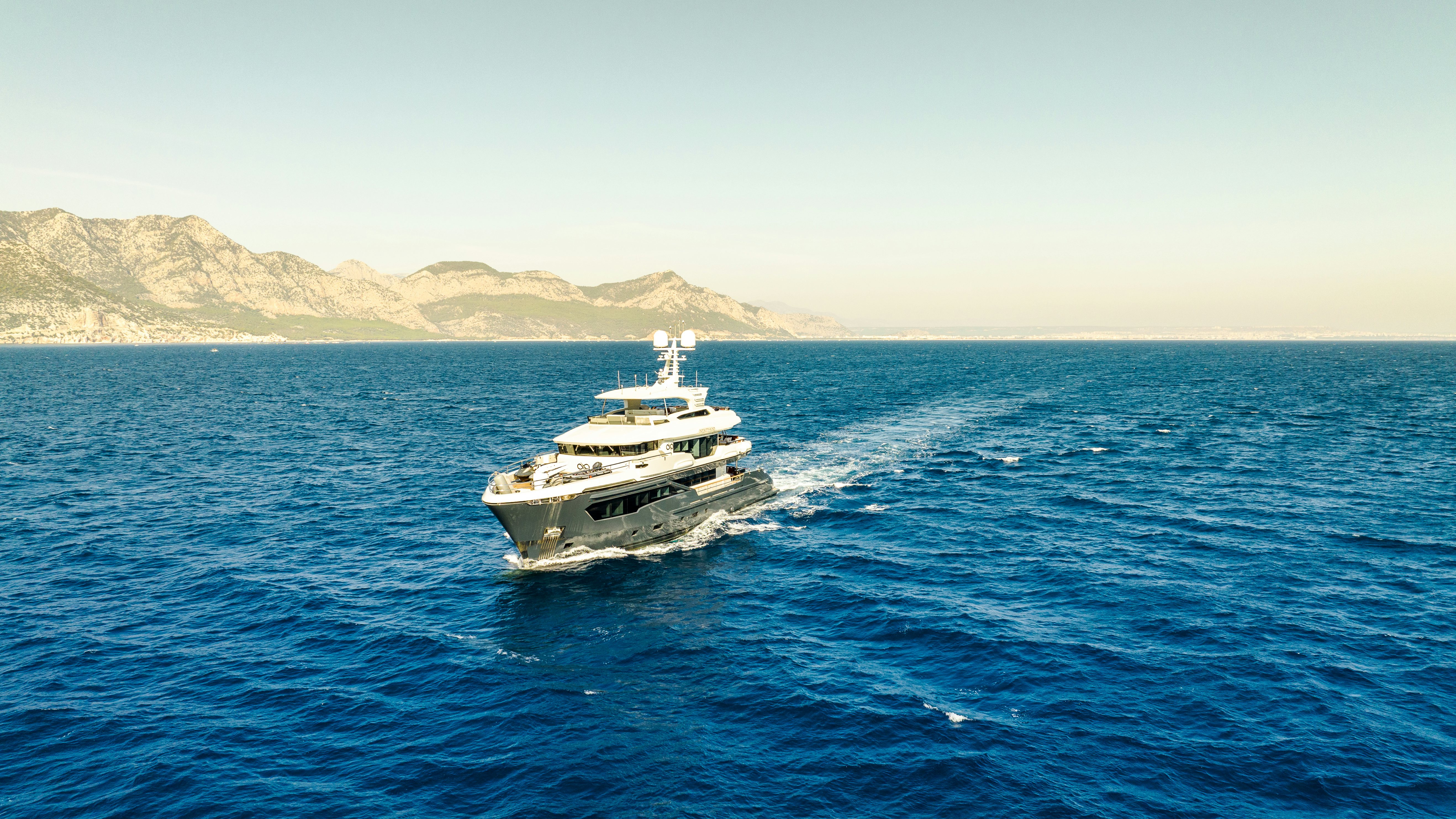 a boat in the water aboard KANDO 110 Yacht for Sale