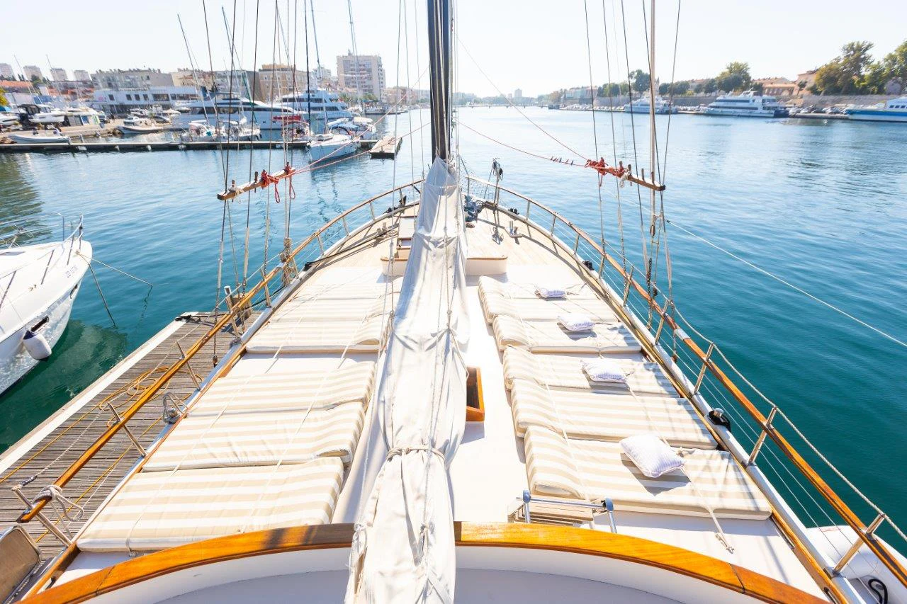 a long dock with boats aboard GULET GARDELIN Yacht for Charter