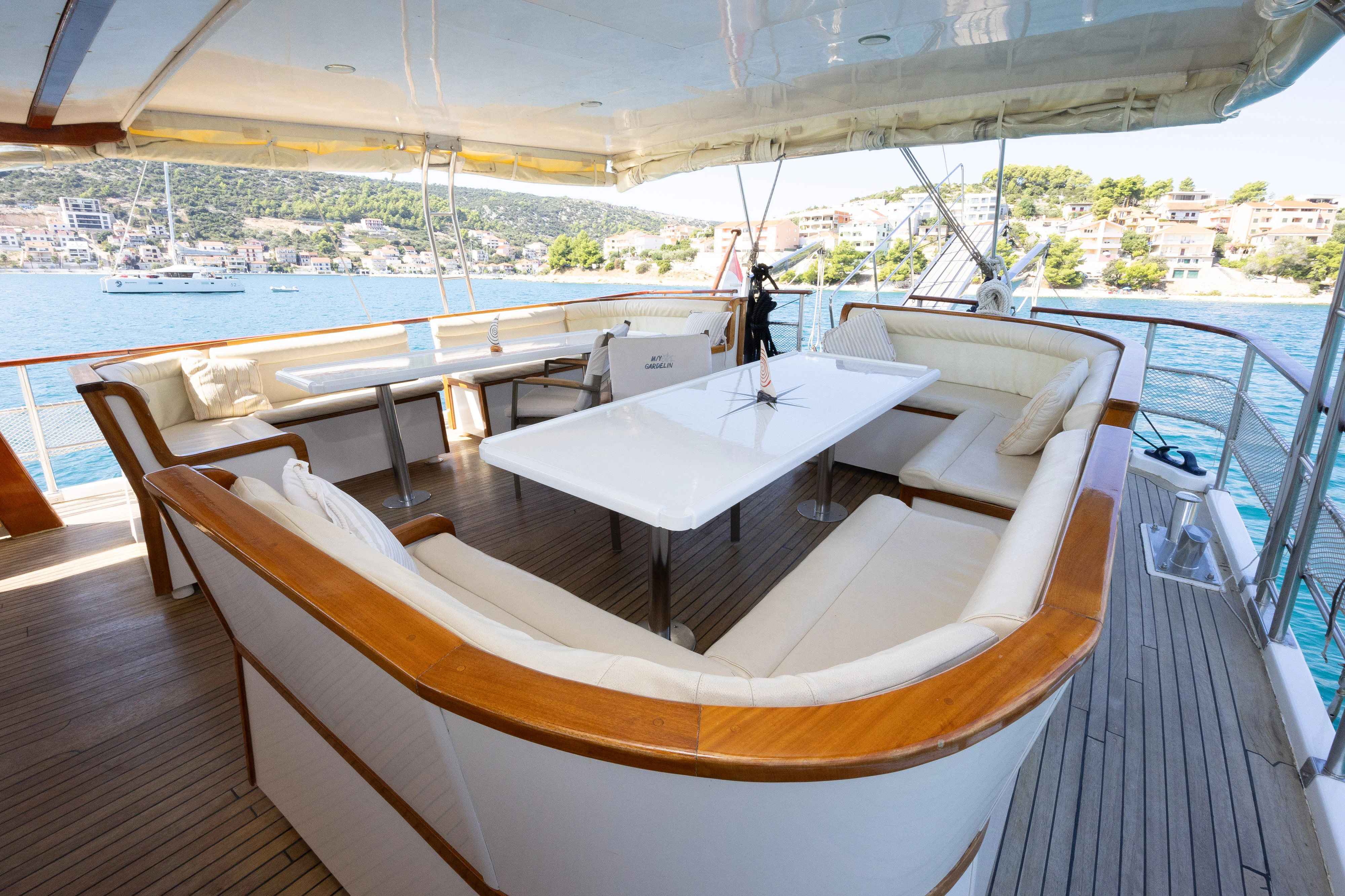 a room with a table and chairs aboard GULET GARDELIN Yacht for Charter