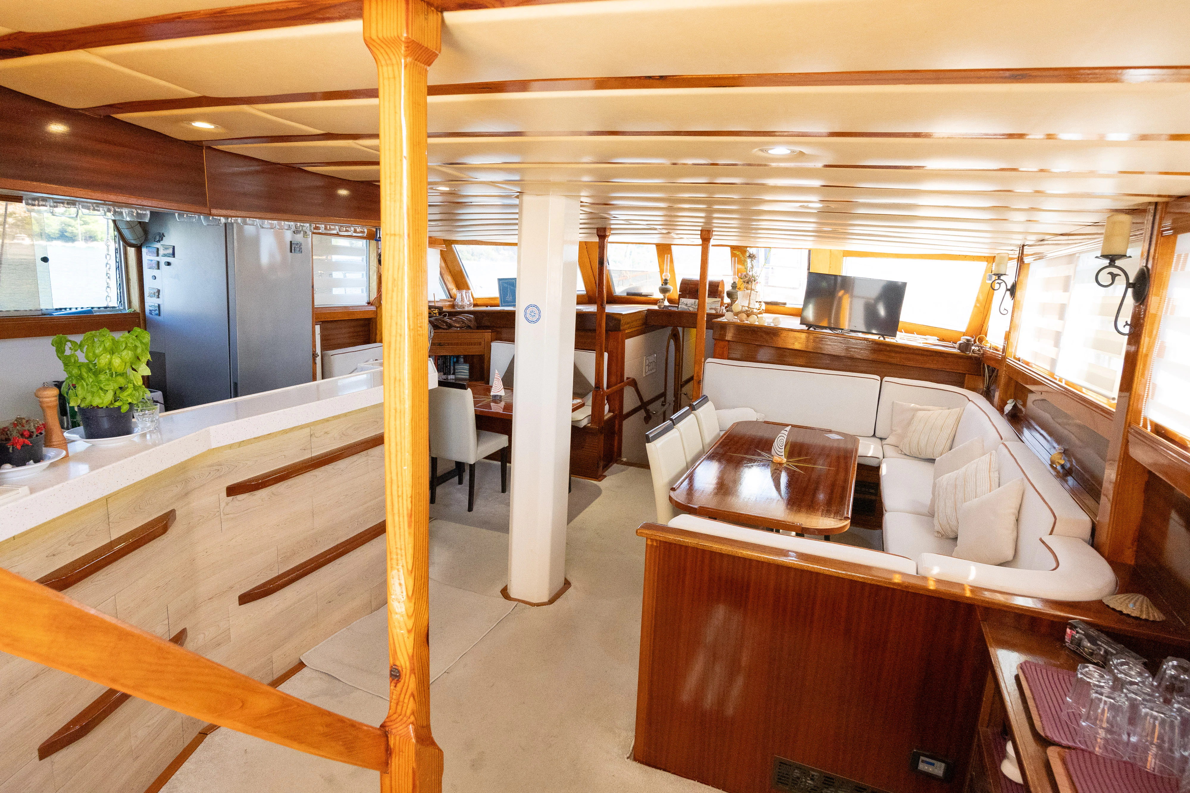 a kitchen with wooden cabinets aboard GULET GARDELIN Yacht for Charter