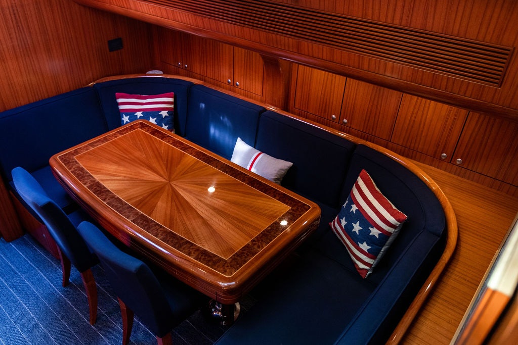a large wooden piano aboard CABOCHON Yacht for Sale