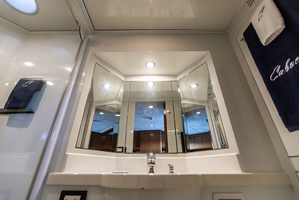 a bathroom with a large mirror aboard CABOCHON Yacht for Sale