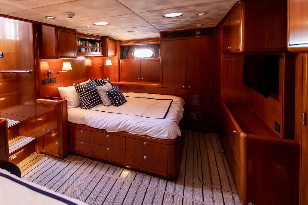 a bed in a cabin aboard CABOCHON Yacht for Sale