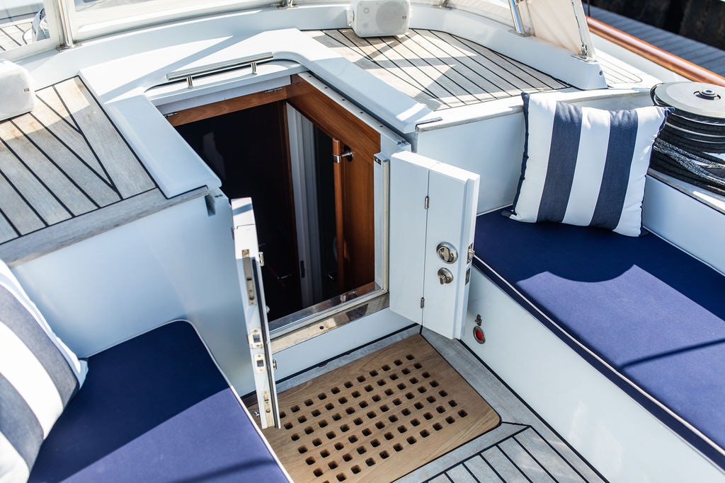 a car with a door open aboard CABOCHON Yacht for Sale