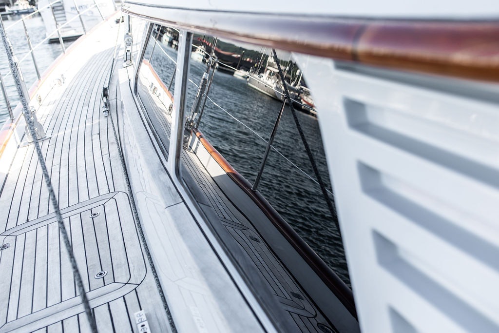 a large ship in the water aboard CABOCHON Yacht for Sale