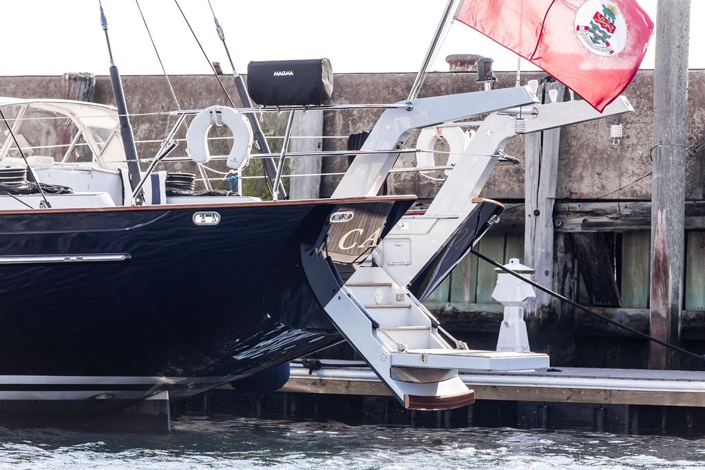 a boat docked at a pier aboard CABOCHON Yacht for Sale