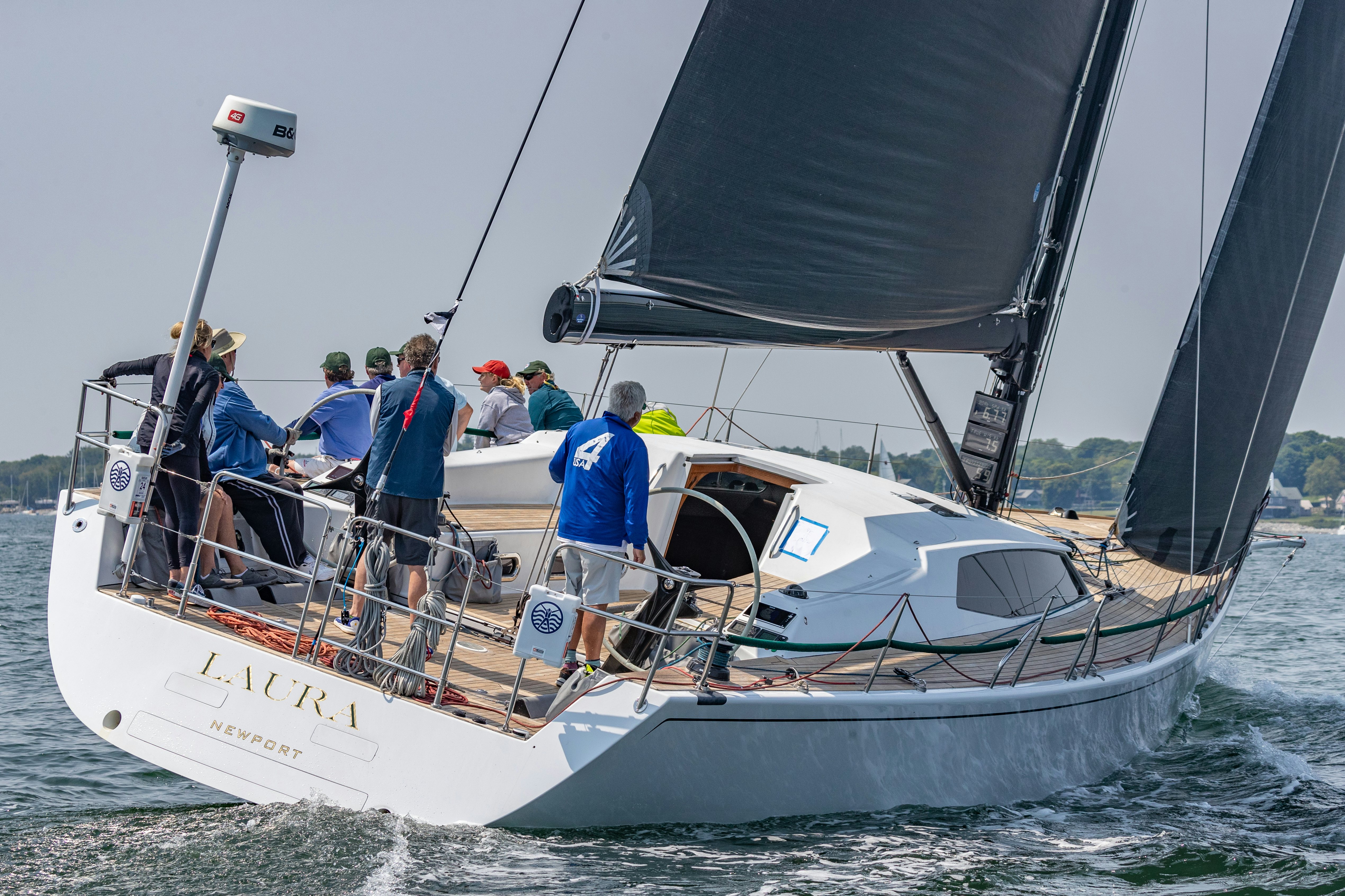 a group of people on a boat aboard LAURA Yacht for Sale