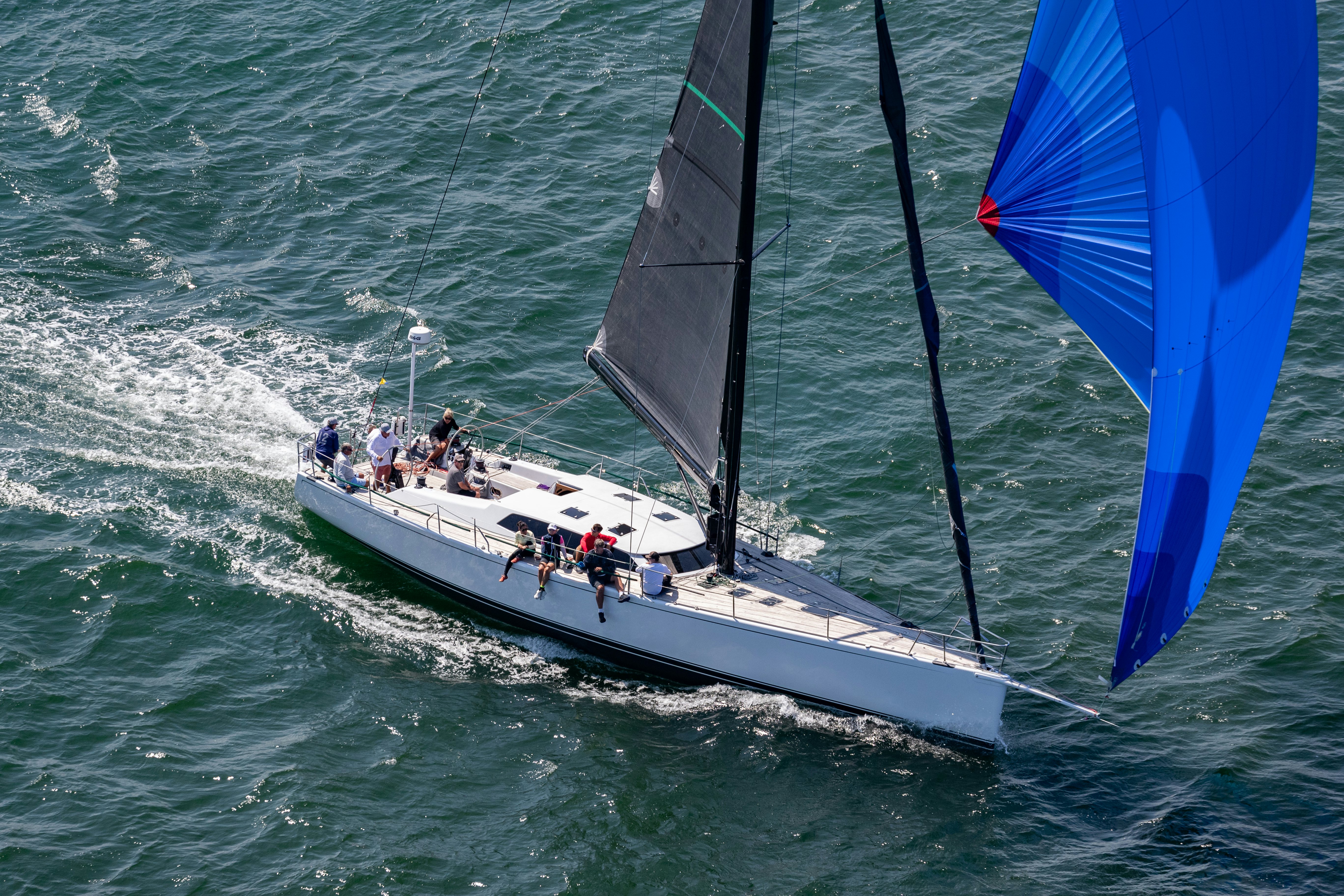 a group of people sailing on a sailboat aboard LAURA Yacht for Sale