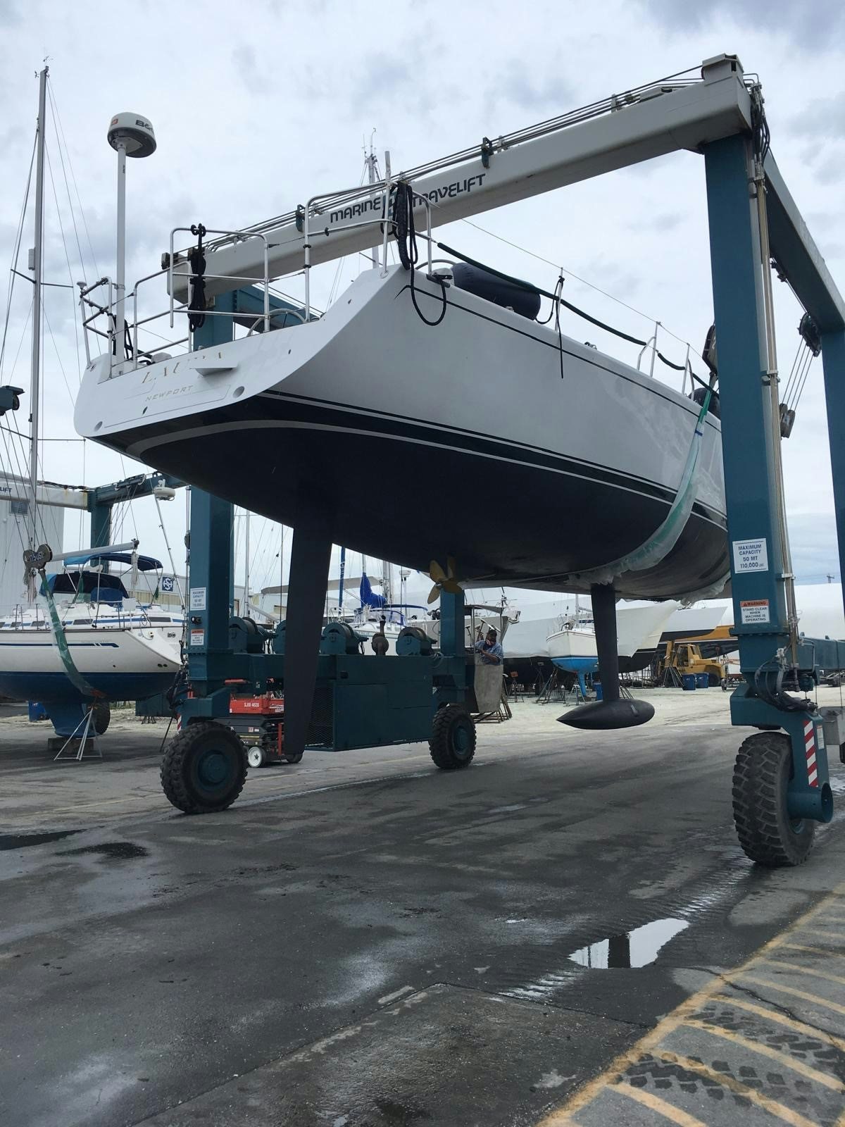 a large boat on a trailer aboard LAURA Yacht for Sale