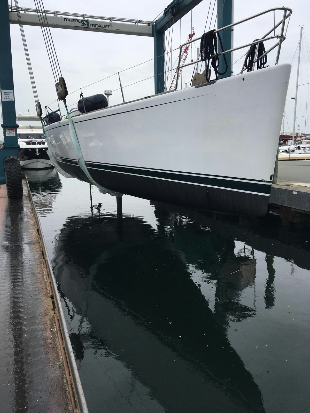 a boat docked at a pier aboard LAURA Yacht for Sale