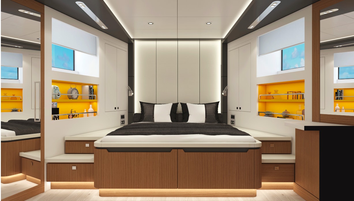 a room with a bed and desk aboard XPM85 Yacht for Sale