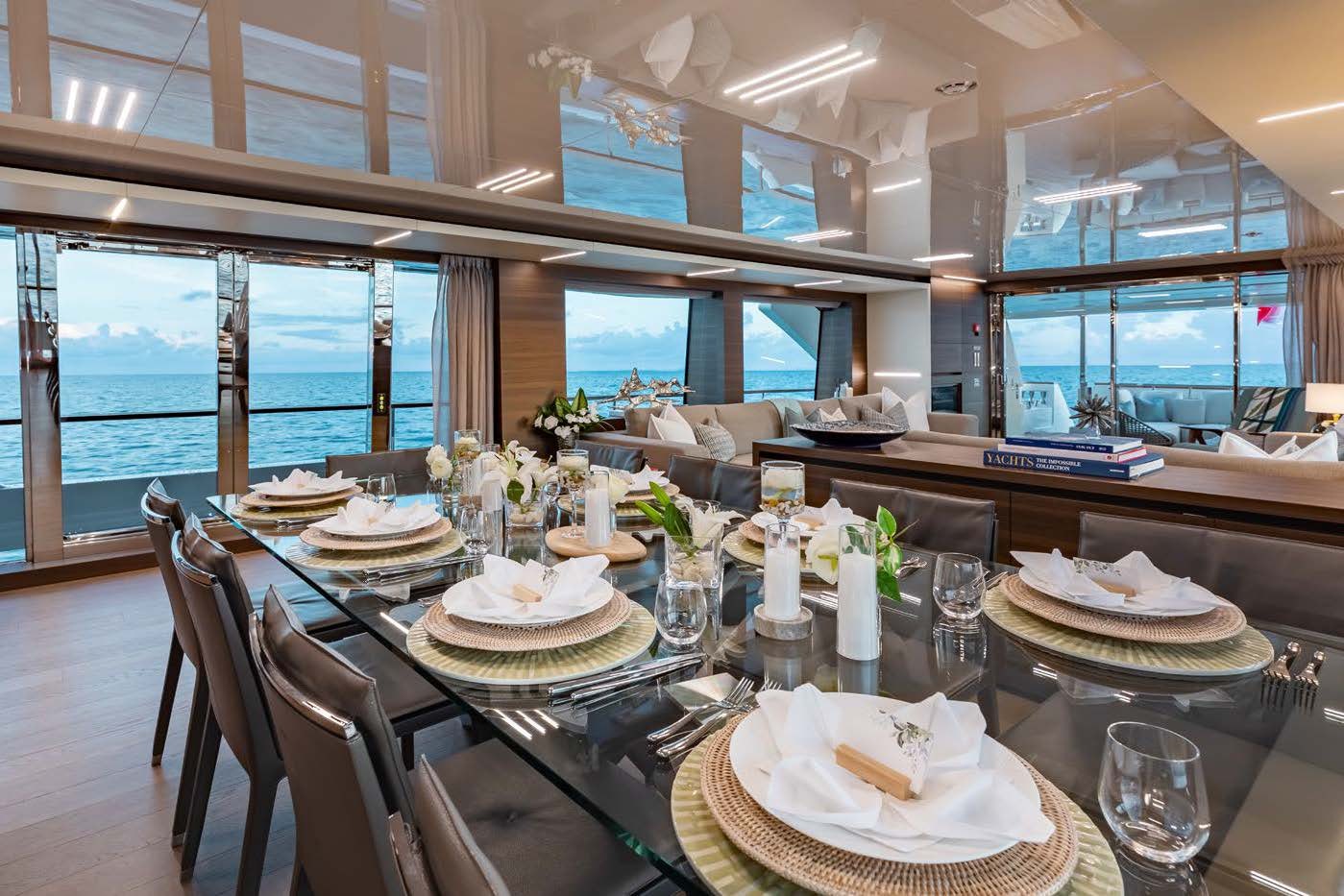 a table with plates and glasses on it aboard EROS Yacht for Charter