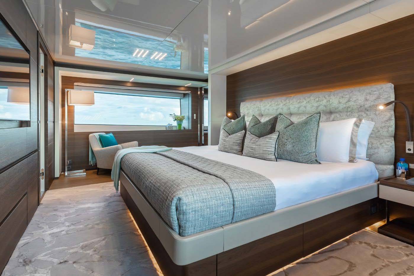 a room with two beds aboard EROS Yacht for Charter