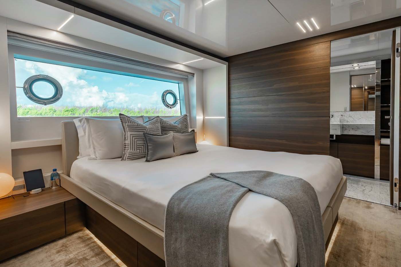 a bed in a room aboard EROS Yacht for Charter