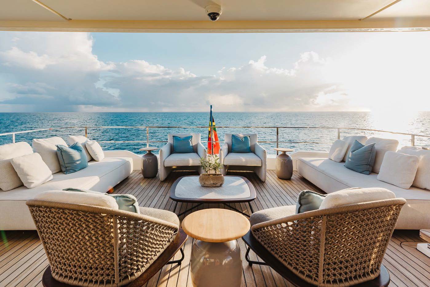 a living room with a large body of water aboard EROS Yacht for Charter