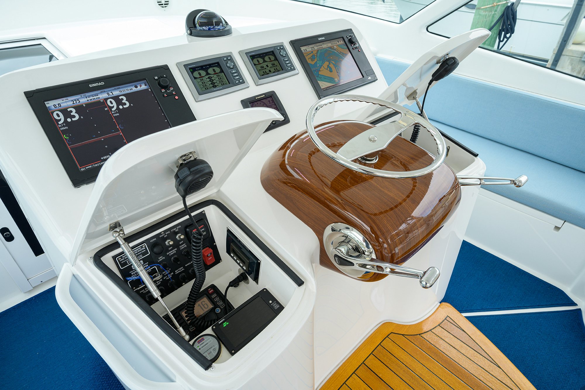 a cup of coffee and a phone on a table aboard GALENE Yacht for Sale