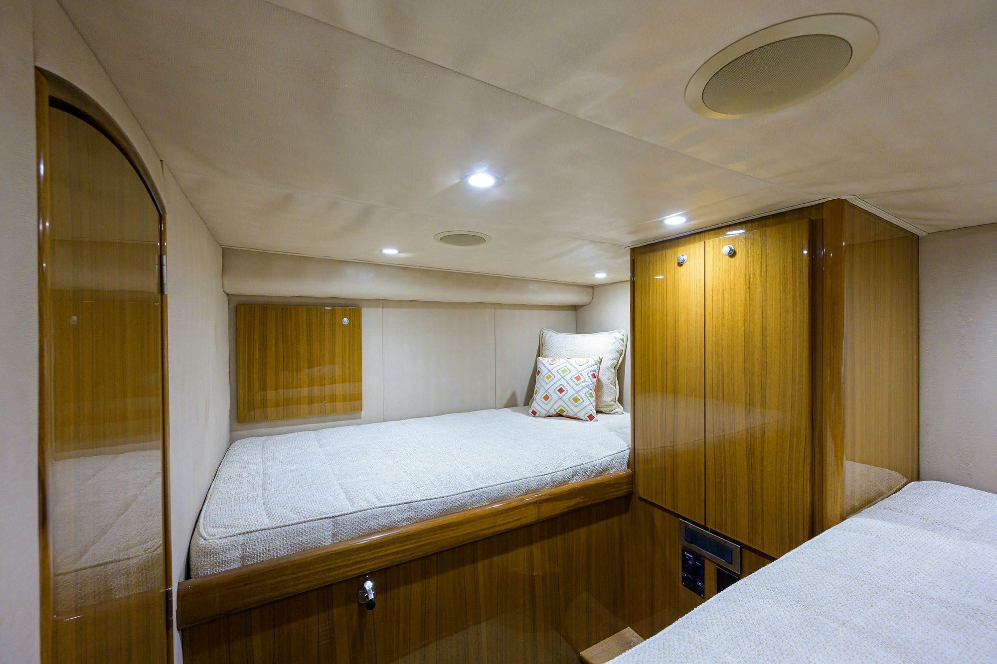 a room with a bed and a closet aboard GALENE Yacht for Sale