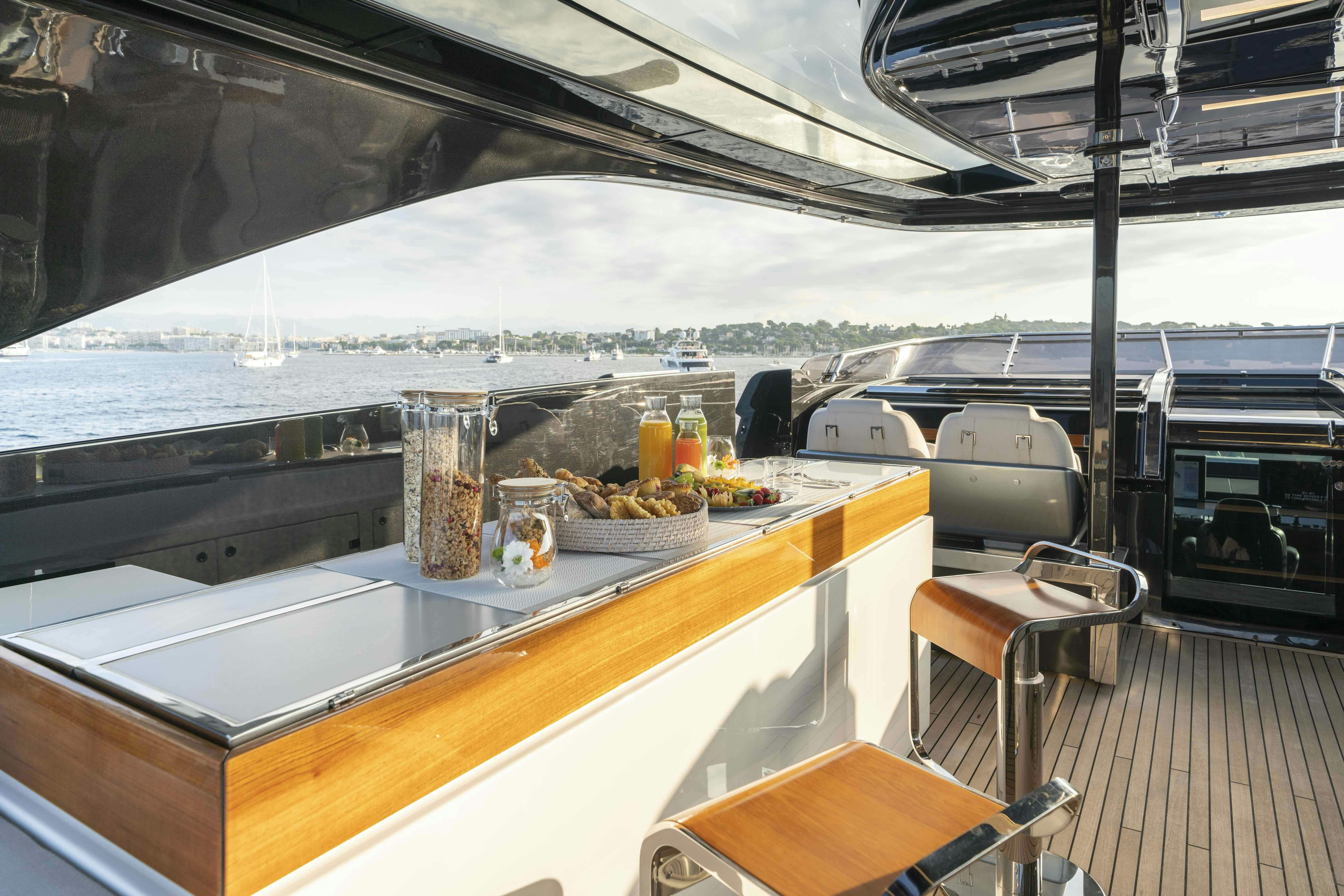 a kitchen with a large window aboard ELYSIUM I Yacht for Sale