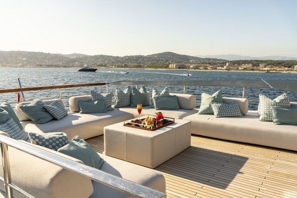 a balcony overlooking a large body of water aboard ELYSIUM I Yacht for Sale