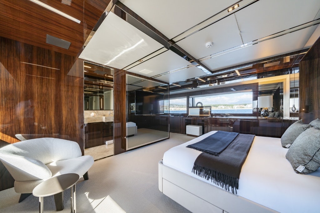 a room with a large glass wall aboard ELYSIUM I Yacht for Sale